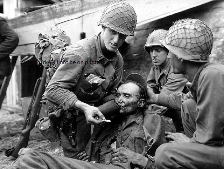 American Officer gives water to Wounded German Soldier 8"x 10" WWII Photo 349
