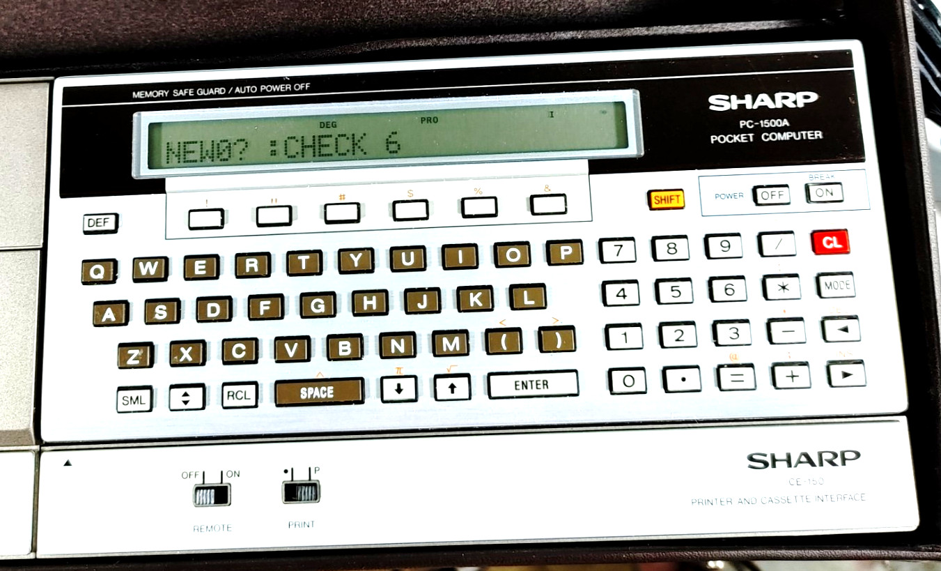 Sharp PC1500A Pocket Computer w/ CE150 Printer/Cassette Interface Turns On CASE