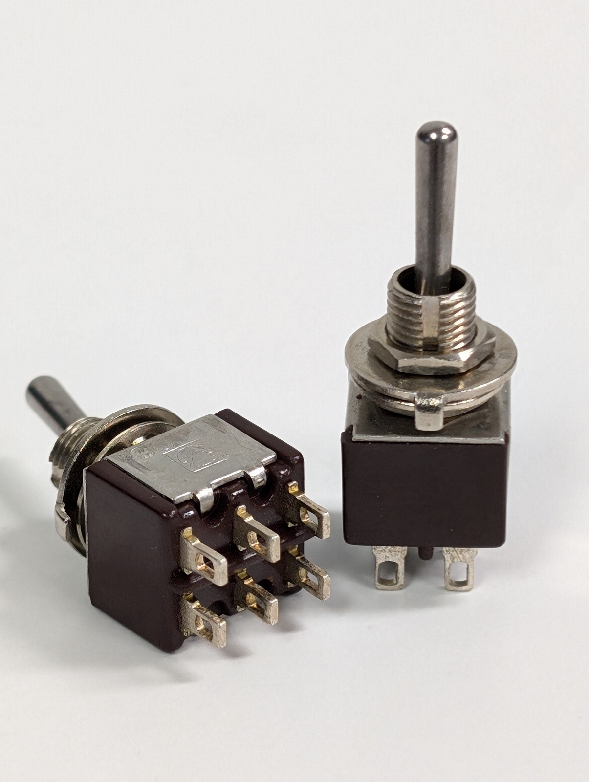 MINIATURE DPDT MOMENTARY ONE SIDE TOGGLE SWITCH