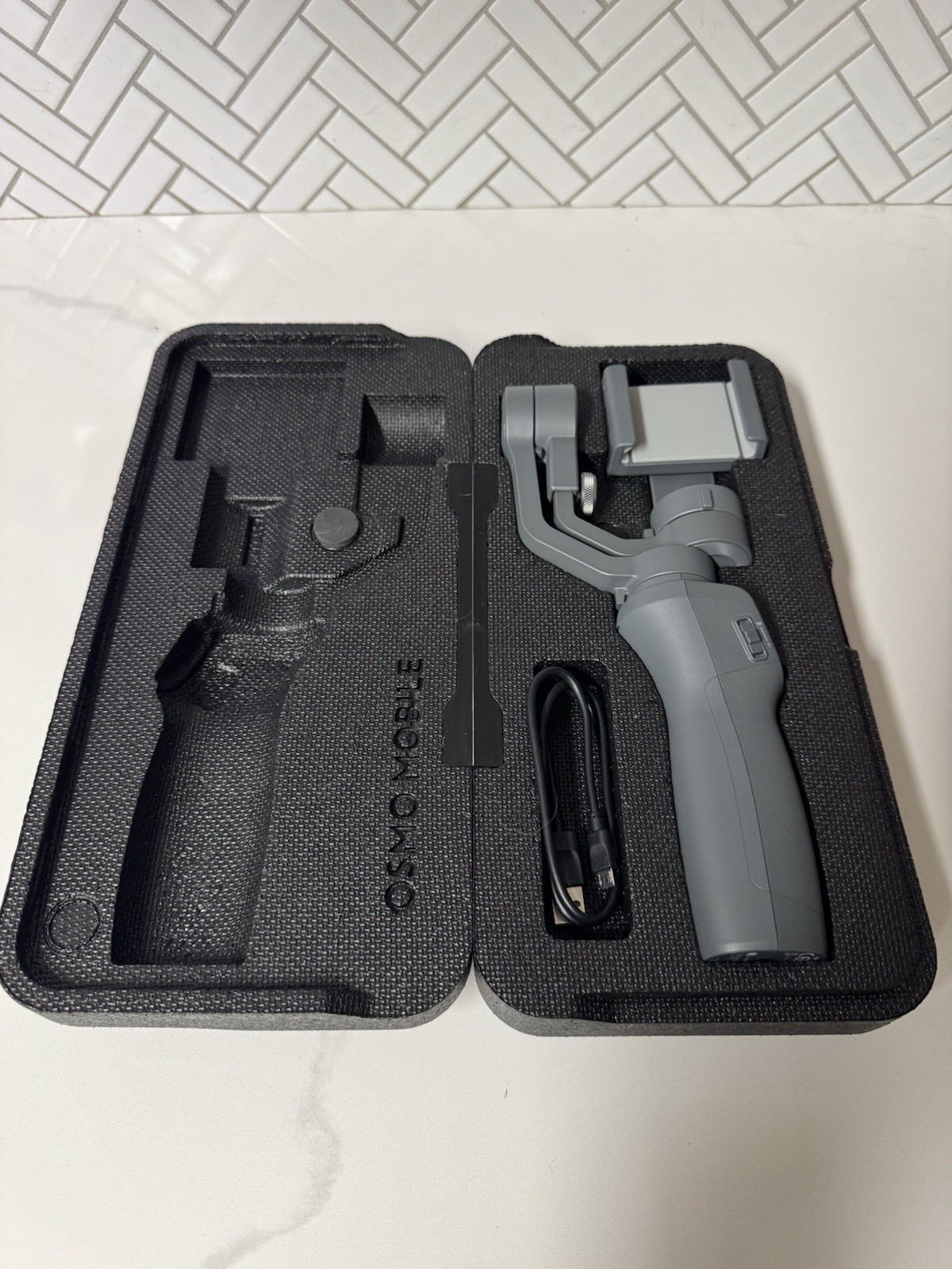 DJI Osmo Mobile Universal Smartphone Gimbal Stabilizer with Case & Cable