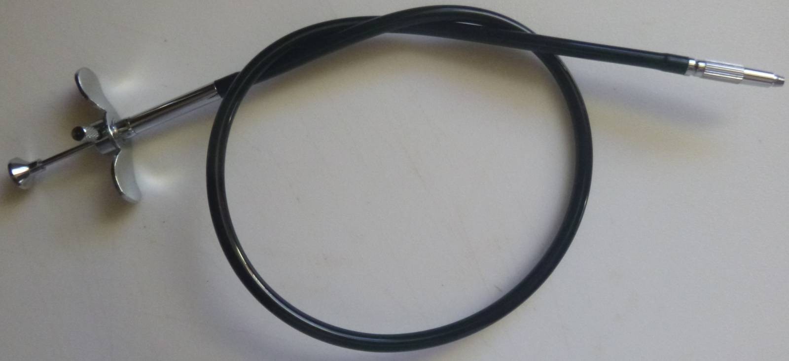 20 inch vinyl covered braided metal cable release with locking button.