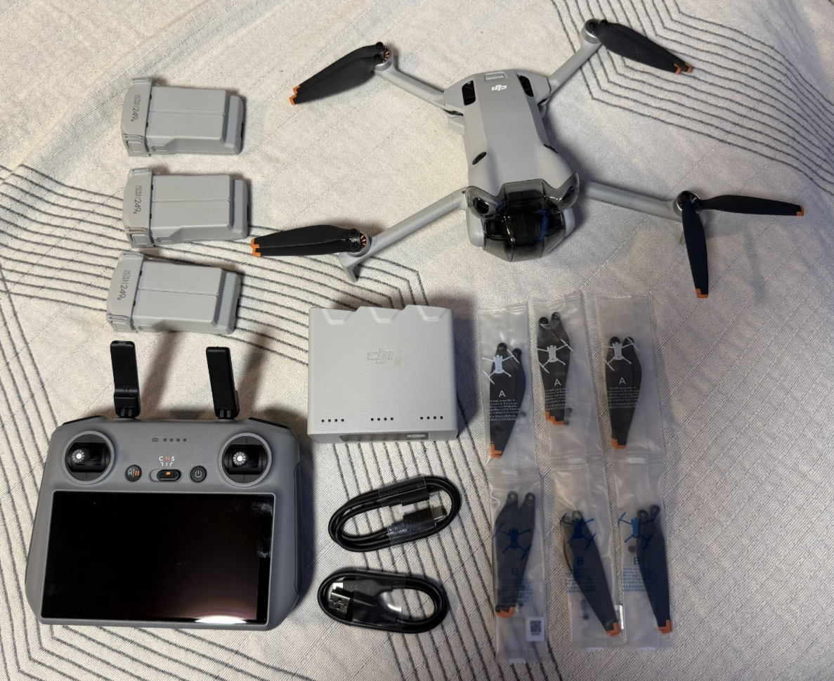 DJI Mini 4 Pro Fly More Combo Camera Drone with remote and accessories