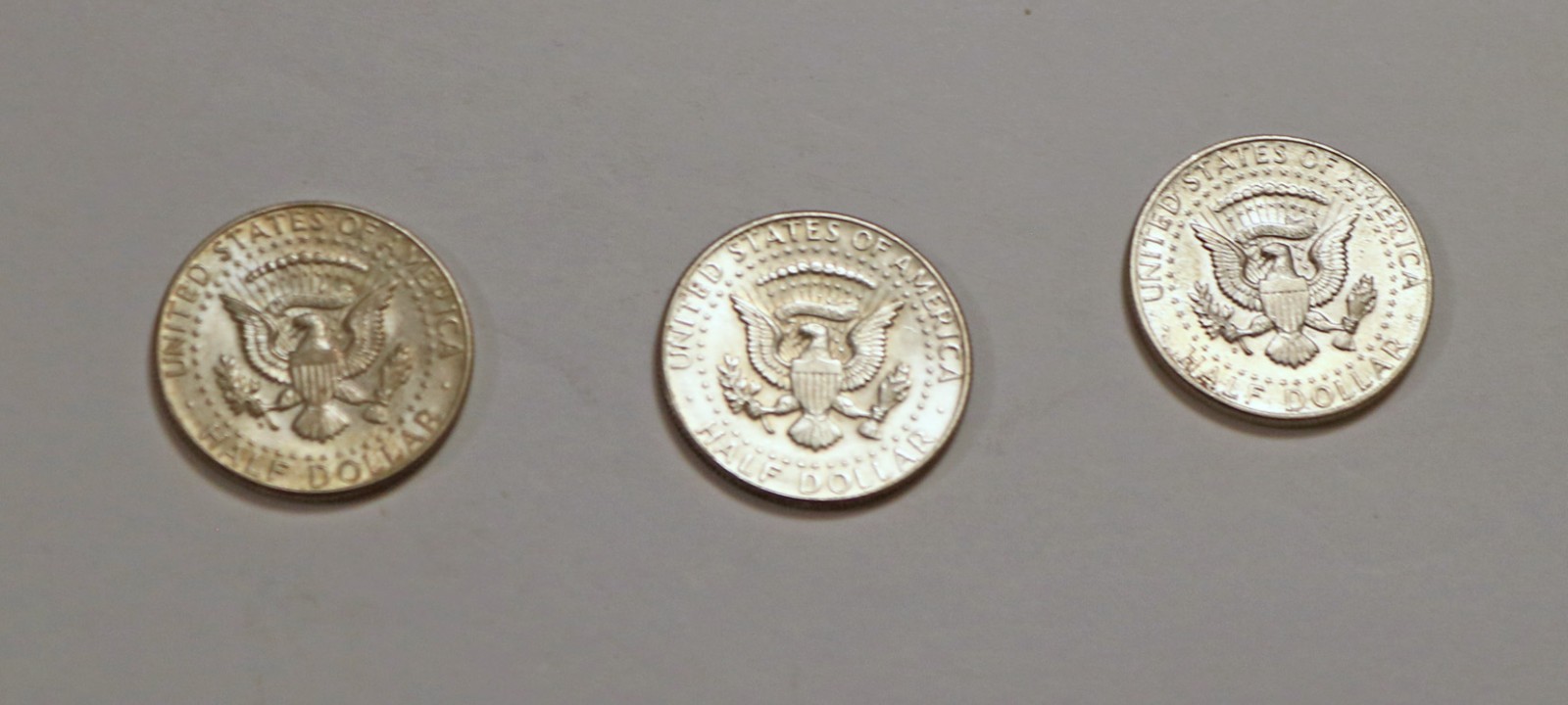 Three 1964 90% Silver Kennedy Half Dollars