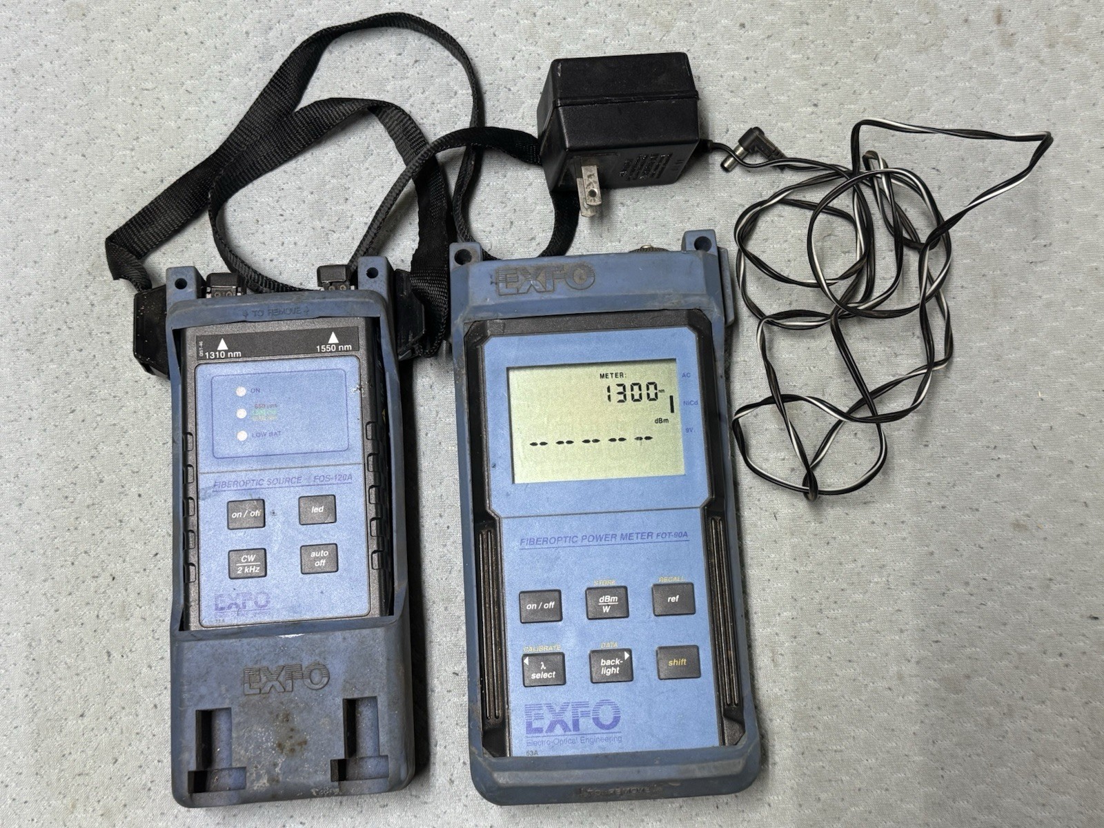 EXFO FOT-90A fiber optic power meter and an EXFO FOS-120A fiber optic source