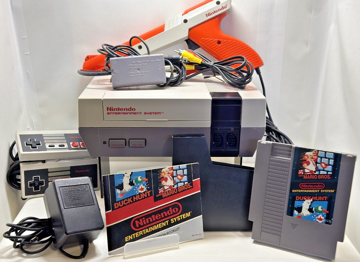 NES: Action Set- CIB- VG Cond.-Orange Zapper Version W/ game, manuals & Inserts