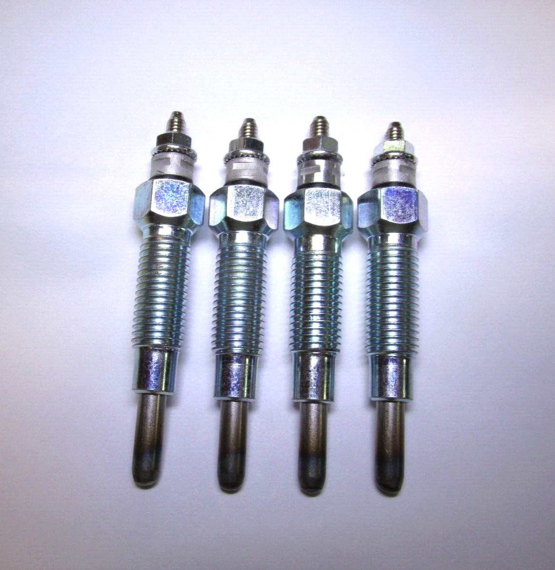 4 Glow Plugs for New Holland Skid Steer L454, L455, L553, L555 with V1402 V1702
