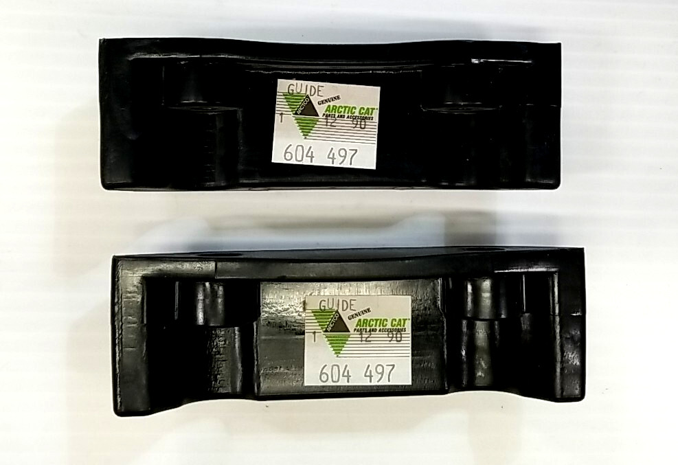 NOS PAIR OF OEM ARCTIC CAT  TRACK GUIDES 0604-479  ARTIC