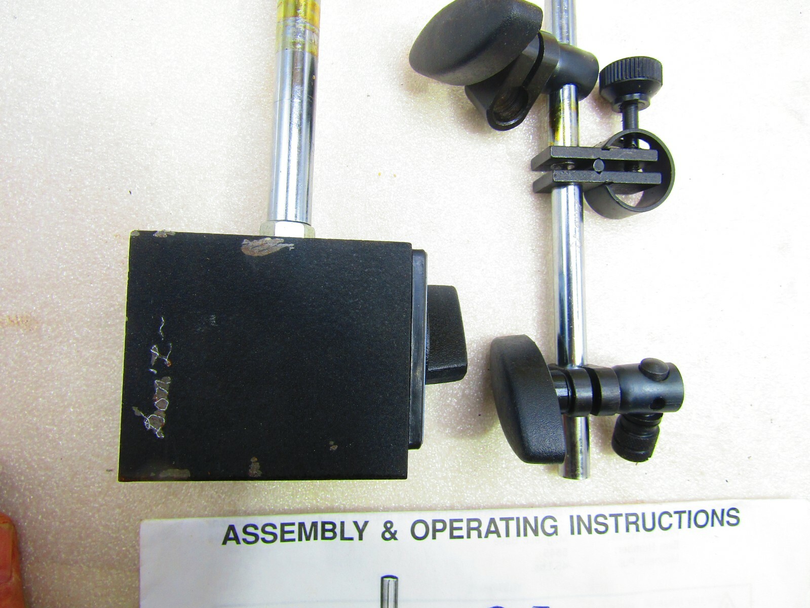 Magnetic base gauge holder by Cen-Tech