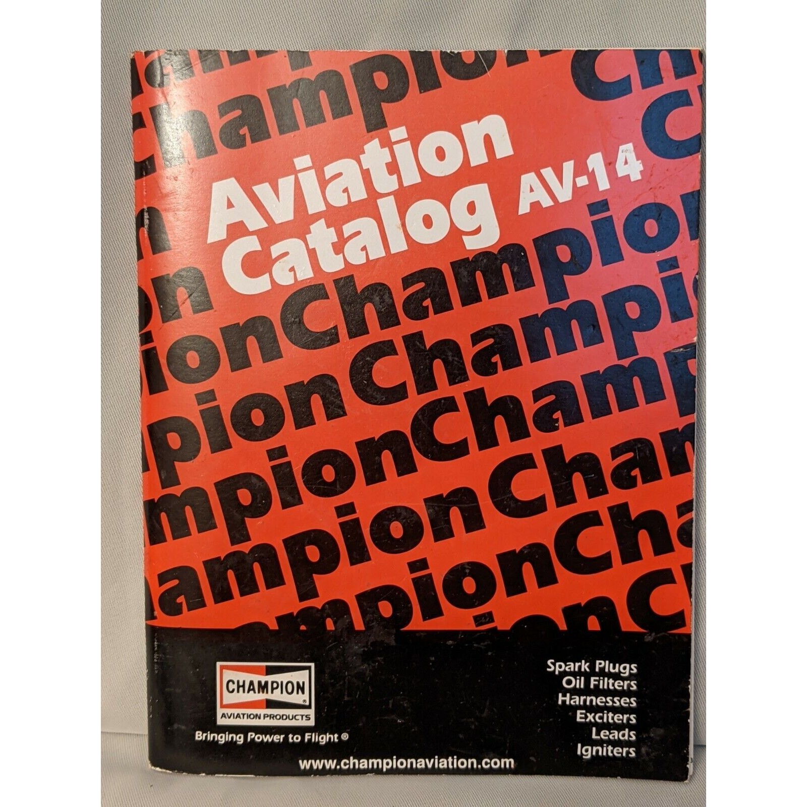 Champion Aviation Catalog AV-14 for Spark Plugs, Oil Filters, Exciters, Leads