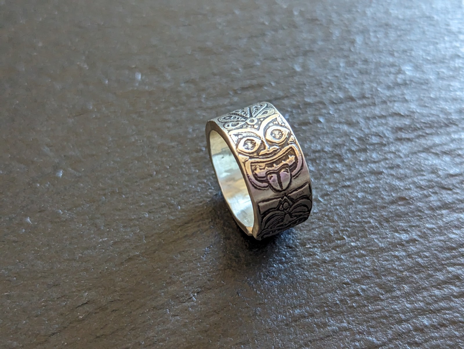 Thick sterling silver ring with tiki gods - handmade - open design