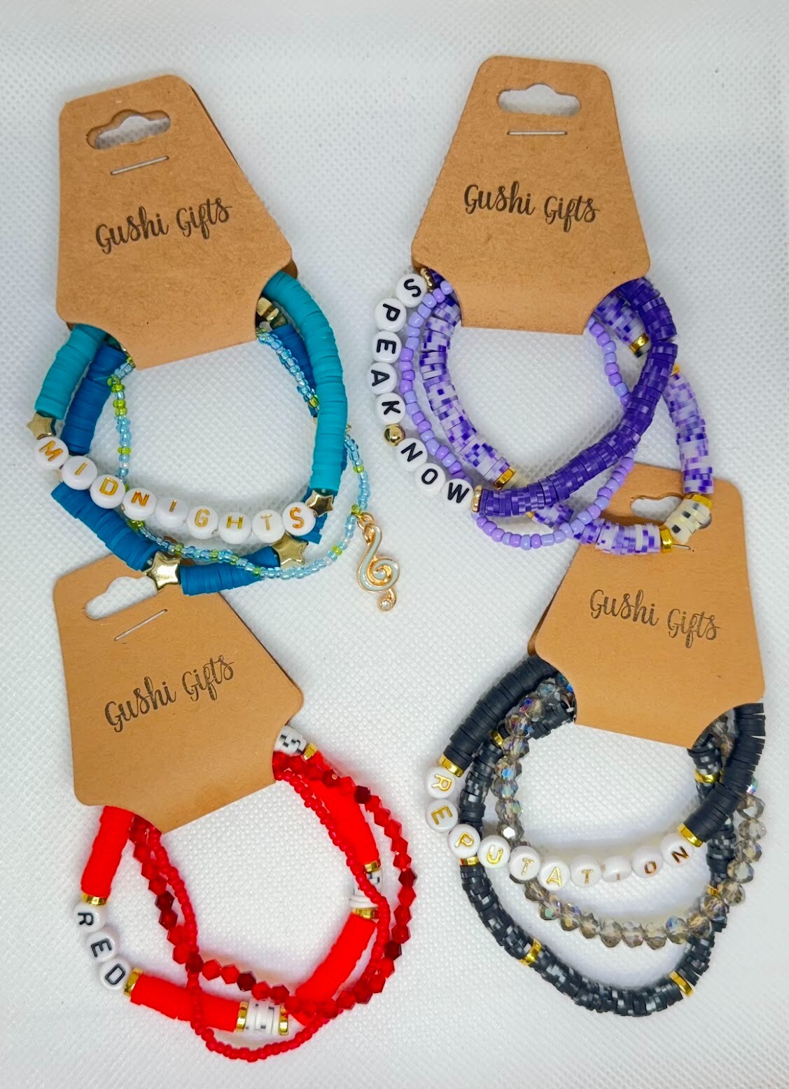 4 Sets of Handmade Beaded Bracelets with Charms Swifty