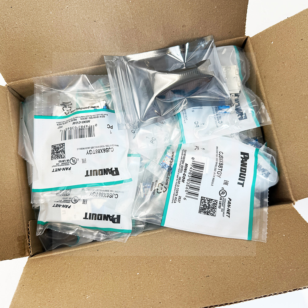 Brand New Panduit Netkey Mini-Com TX6A 10GIG CJS6X88TGY Box of 50 Color Blue