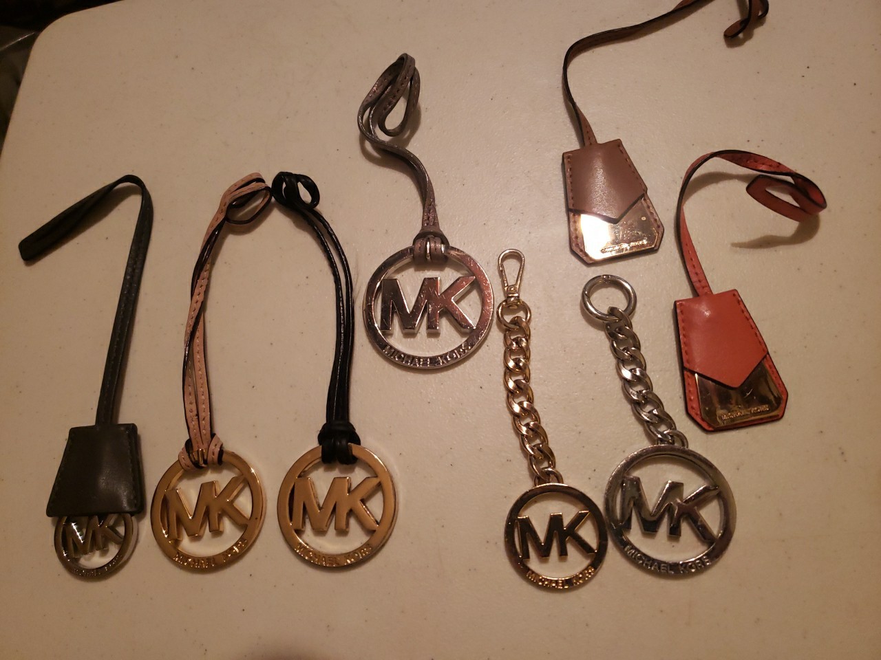 LOT OF 8 MICHAEL KORS BAG, PURSE REPLACEMENT  HANG- TAGS, CHARMS METAL LEATHER