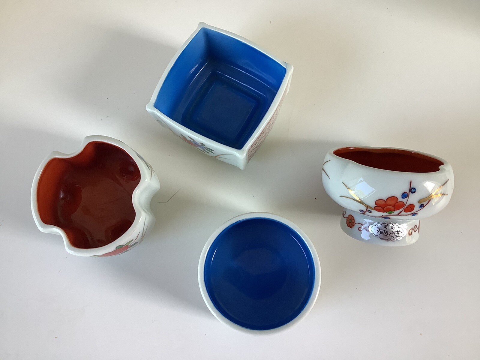 Four mini Asian floral decorated planters