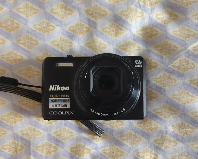 Black Nikon COOLPIX S7000 Digital Camera 16 MP 20x Optical Zoom English Language