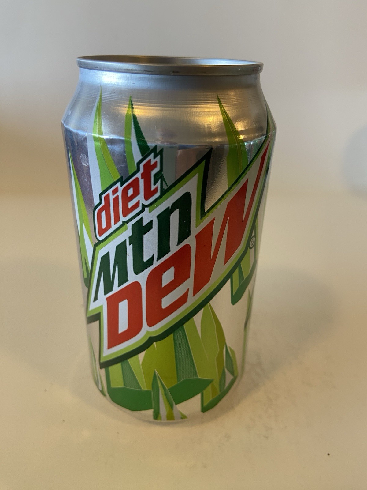 12 oz. DIET MTN DEW SODA CAN EMPTY BOTTOM OPENED