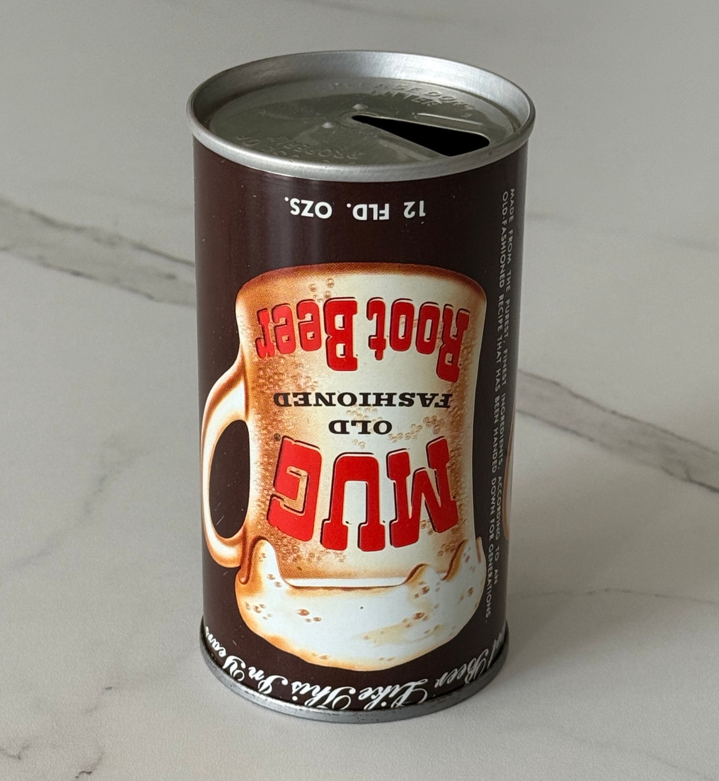 Extremely rare defect soda can, UPSIDE DOWN PRINTING of MUG ROOT BEER steel can.