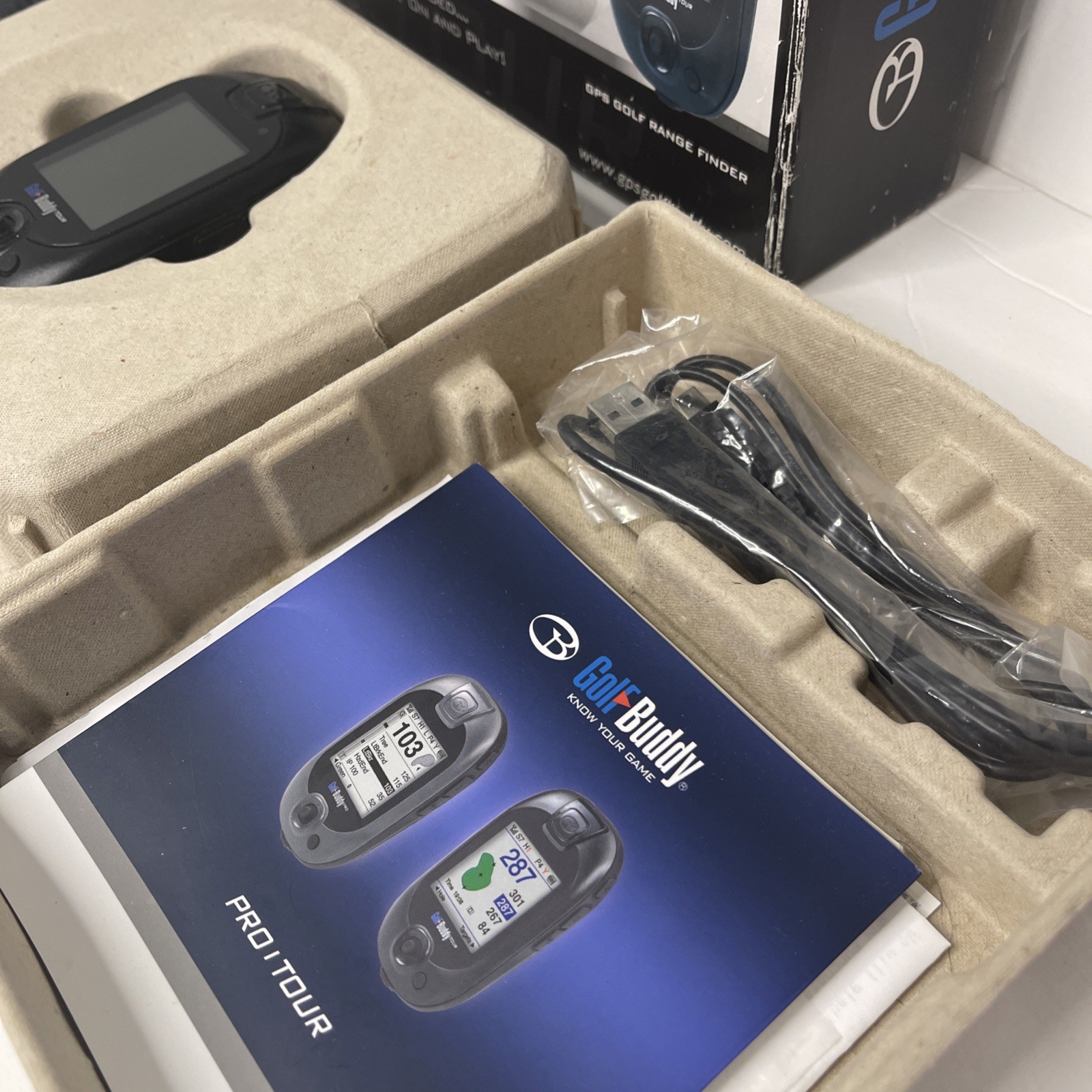 Golf Buddy Tour with Manuals, Belt Clip, Wall Charger, and USB charging cable.