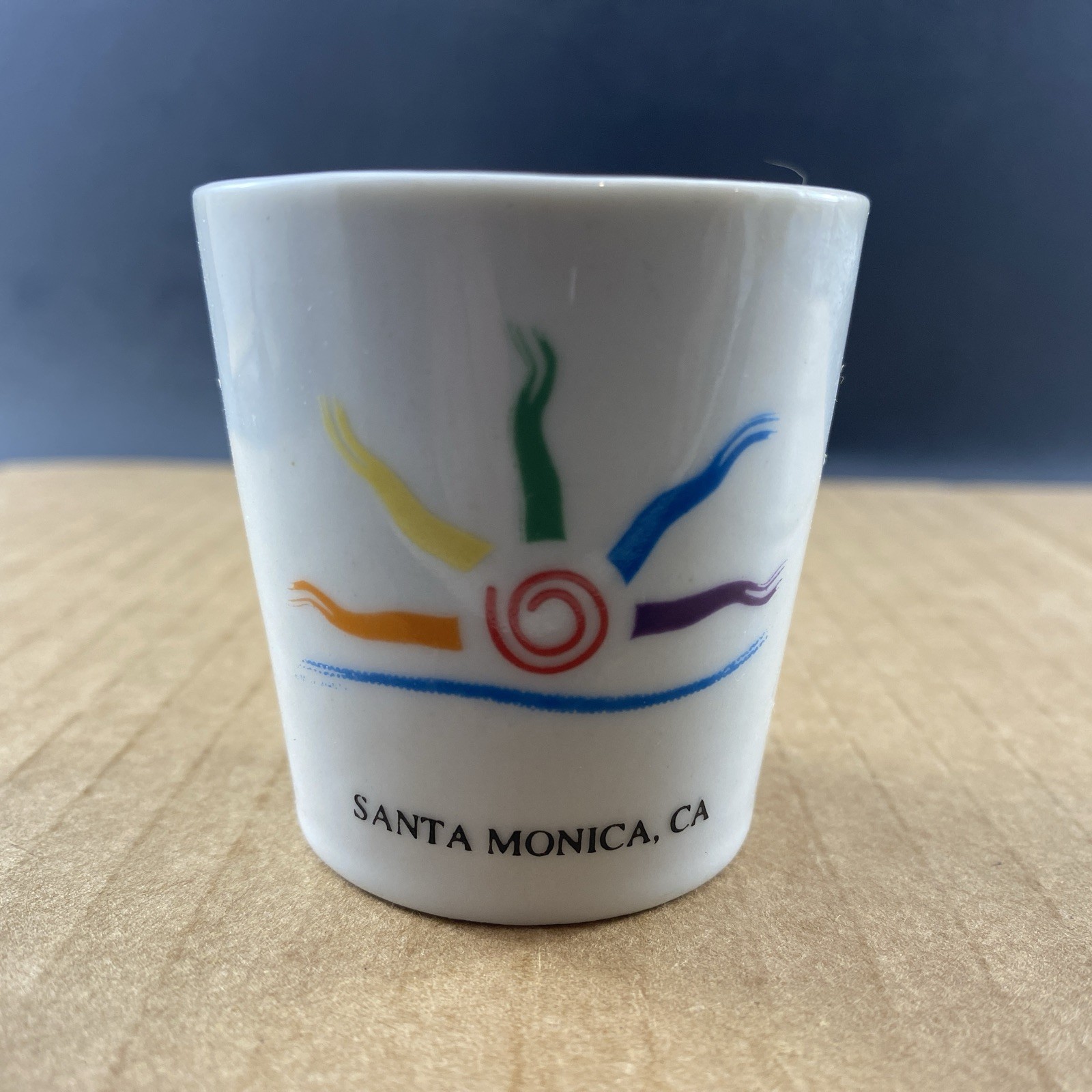 Santa Monica, CA Colorful Sun shot glass, COMB SHIP $1