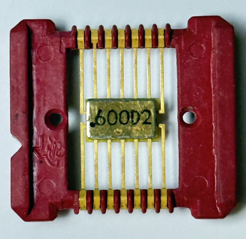 Two 1966 Texas Instruments Integrated Circuits (IC) in Red Carriers