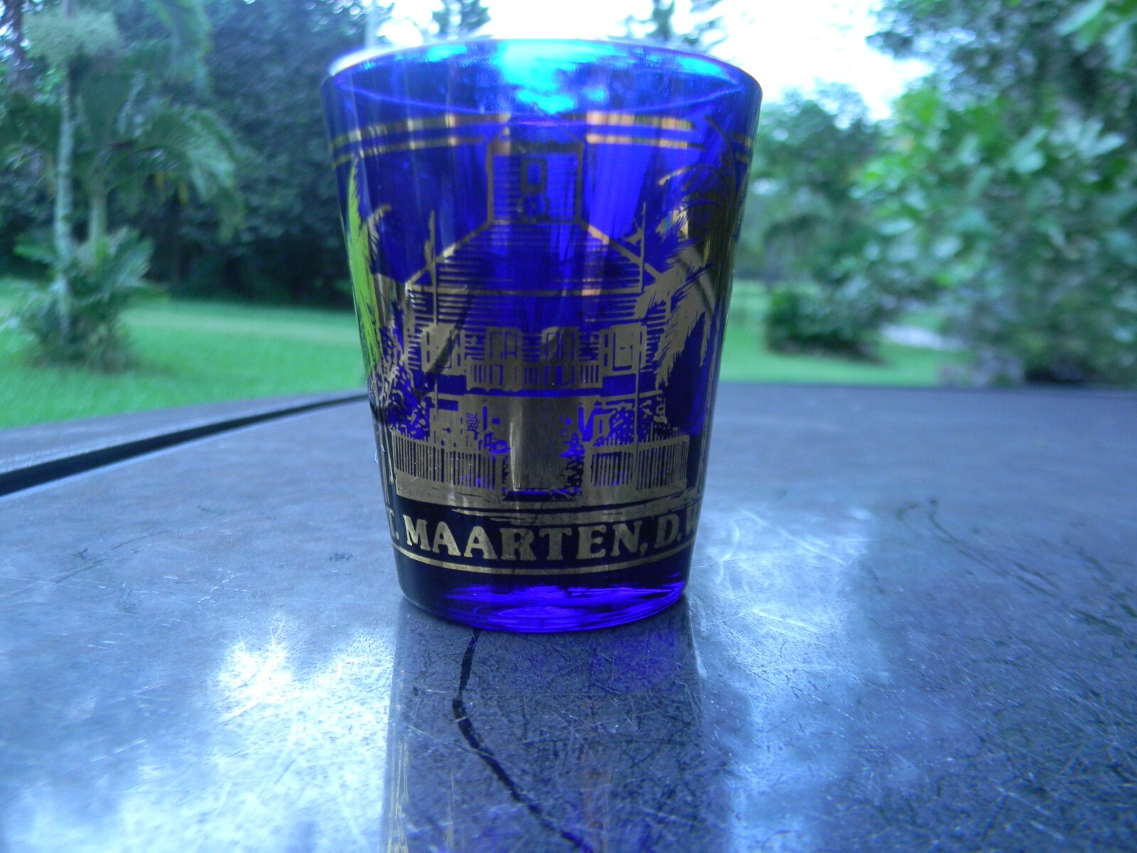 ST. MAARTEN, D. W. I BLUE GLASS SHOT GLASS   2.5" TALL GOLD LOGO