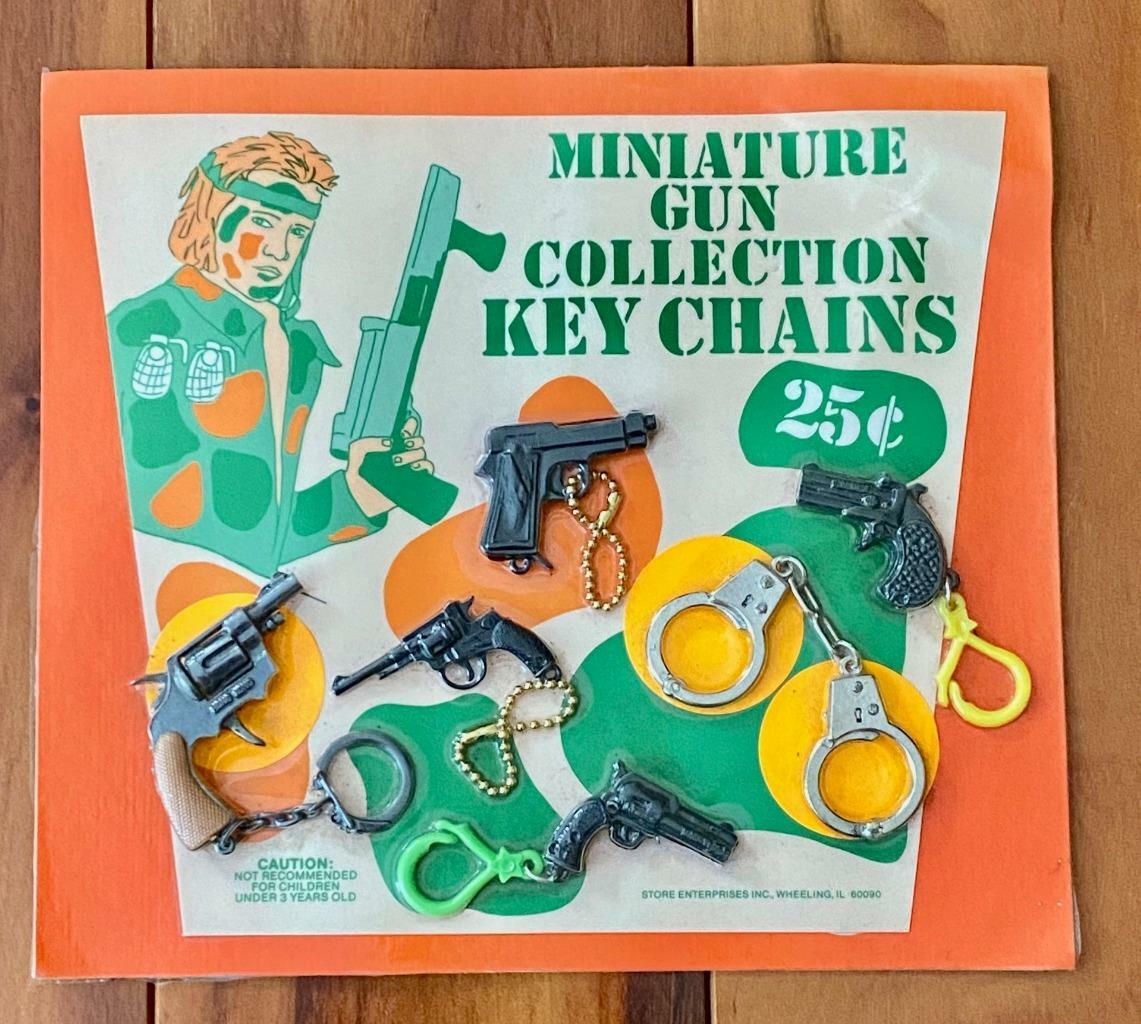 Vintage Gumball Machine Prize Display Card Miniature Gun Collection Key Chains
