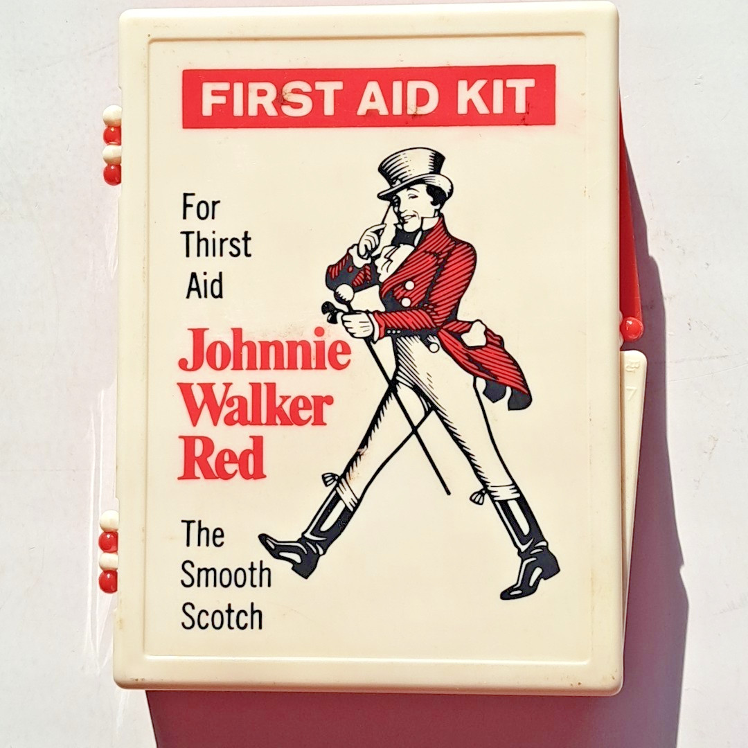 Vintage Promotional Johnnie Walker Red First Aid Kit Swag Scotch Plastic 3 3/4"