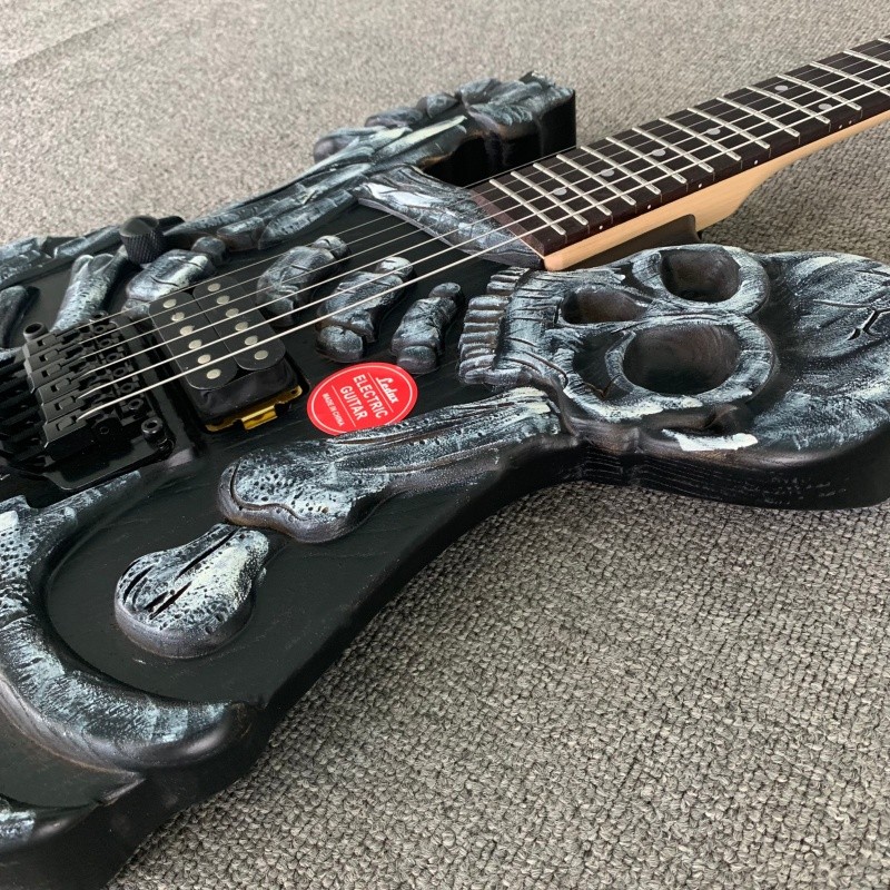 Left Hand Skull Solid Electric Guitar Rounded Fret Edge Maple Neck Hard Rock