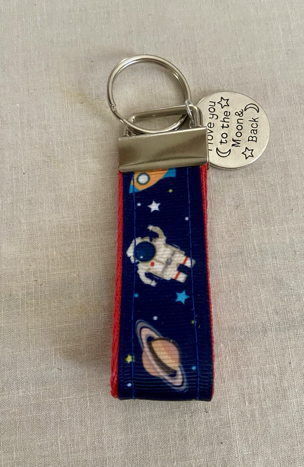 Space Themed 4” Key Fob With Charm Saying “I Love You To The Moon And Back”