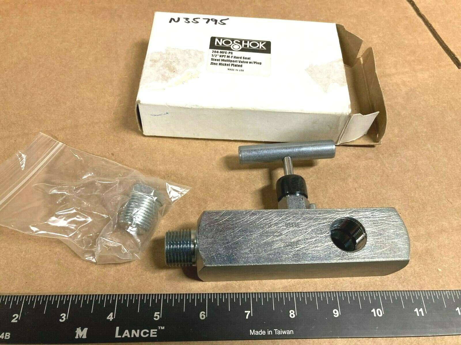 NOSHOK 204-MFC-PG 10000 Psi @ 200 Deg F 1/2" NPT M-F Hard Seat Multi Port w/Plug