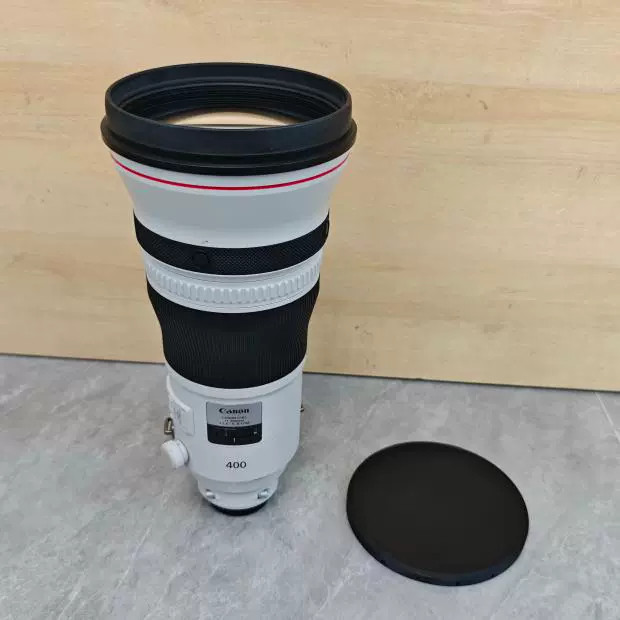 Canon 400mm 1:2.8 L is USM 1st and 2nd generation telephoto lens front cover