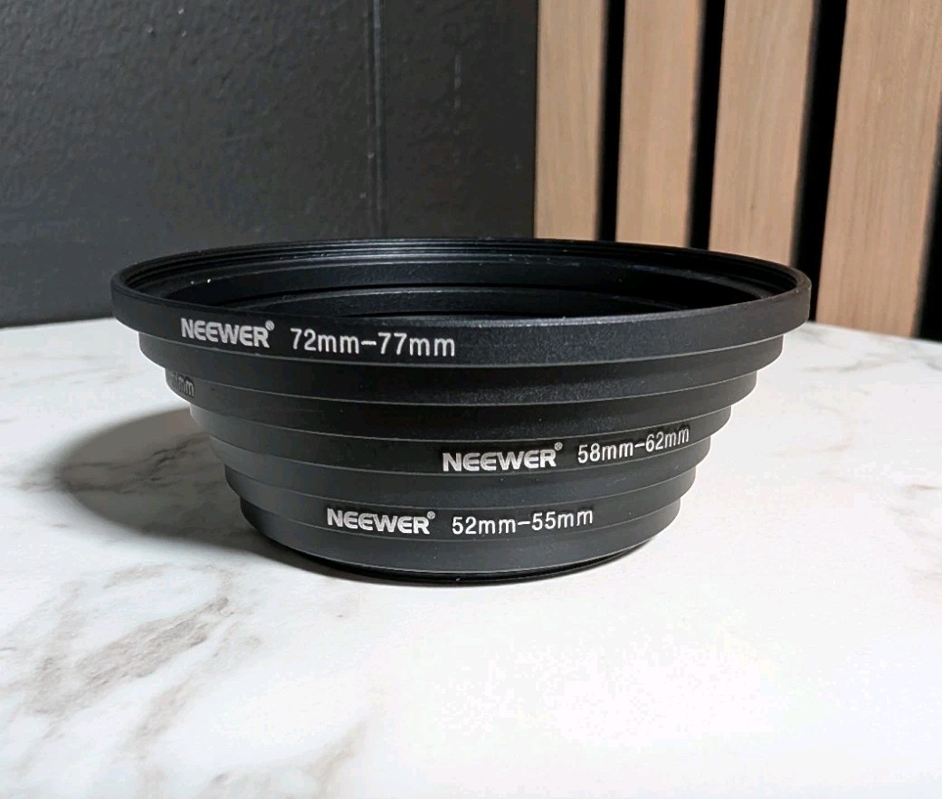 NEEWER 7-Piece Camera Lens Step-Up Filter Adapter Ring Set 49mm-77mm - Black
