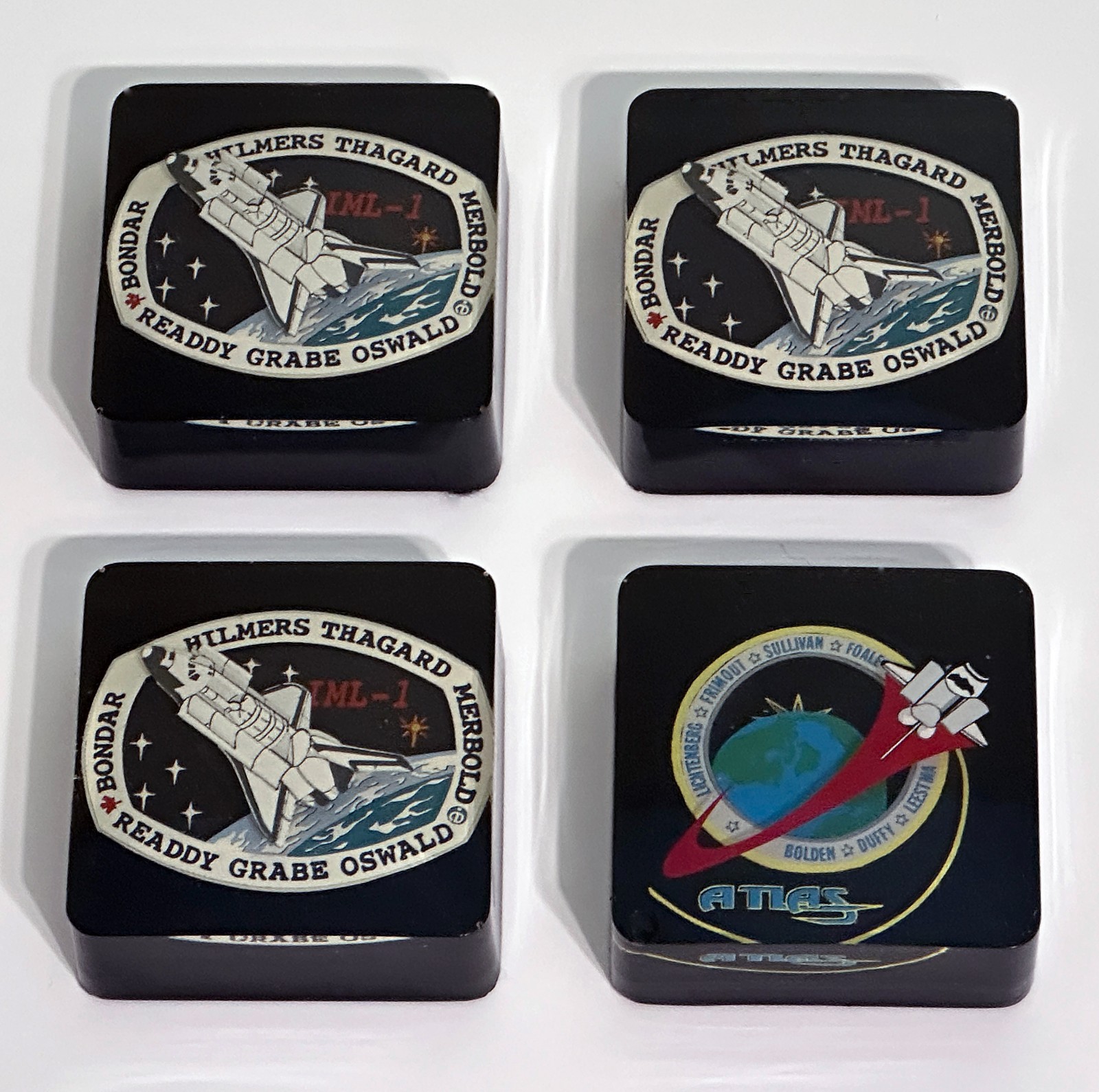 FOUR (4) SPACE SHUTTLE ACRYLIC PAPER WEIGHTS