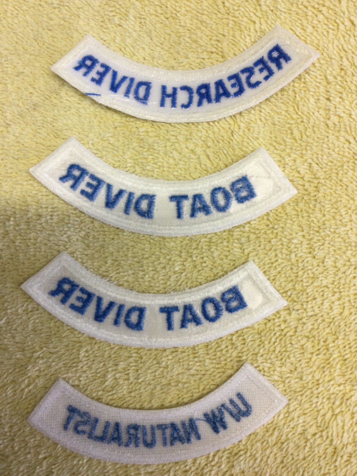 Chevrons 4 total as pictured Blue lettering - White border