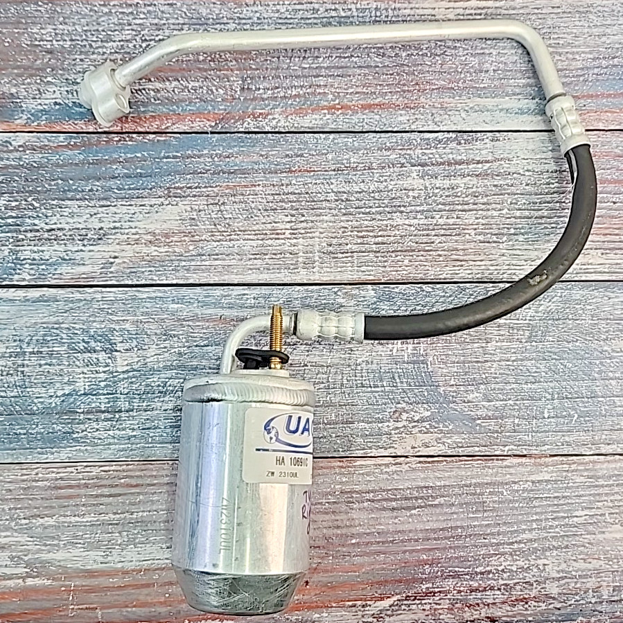 UAC HA10691C AC Receiver Drier w Hose Fits 2005-2007 Montego Freestyle 500 NOS