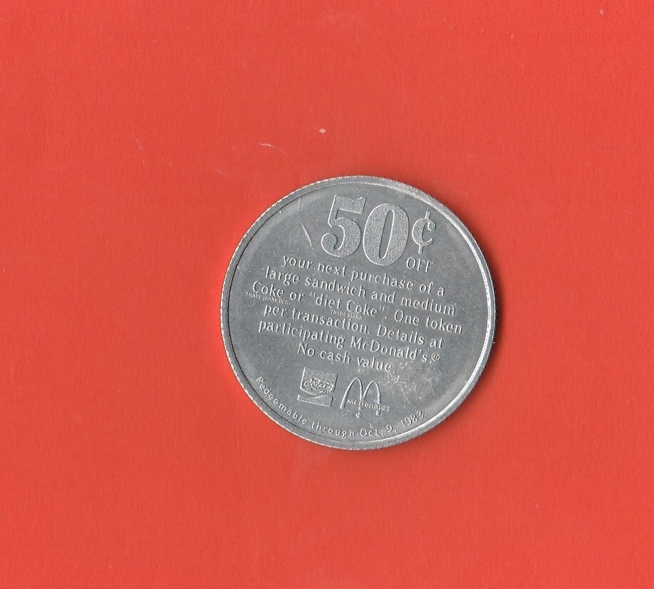 1983 McDONALD'S COCA COLA ALUMINUM MERCHANT TOKEN COIN GOOD FOR 50 CENTS OFF