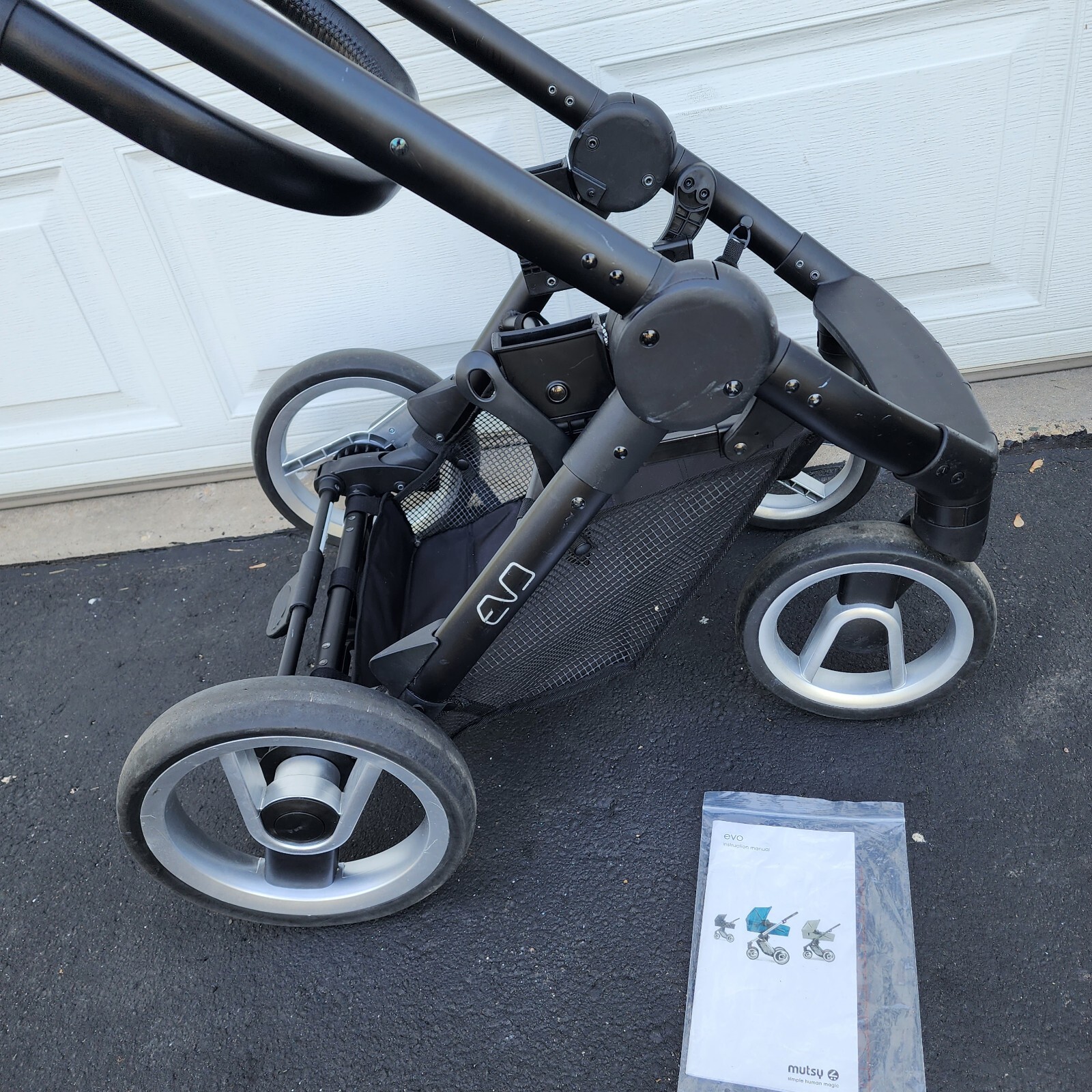 Mutsy Evo Black Stroller Original *Frame +wheels Only* and manual Foldable