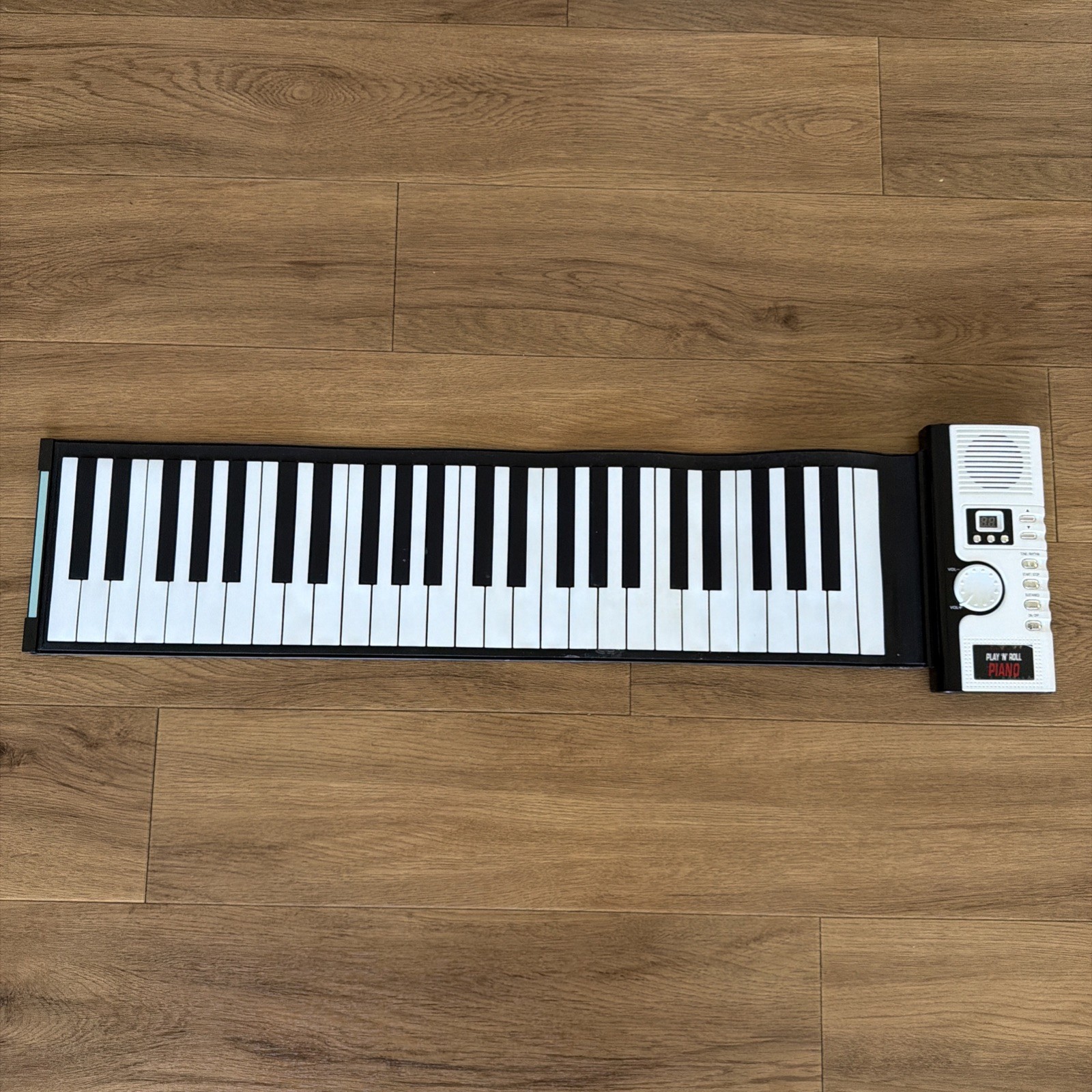 The Sharper Image Play 'N' Roll Digital Piano Used