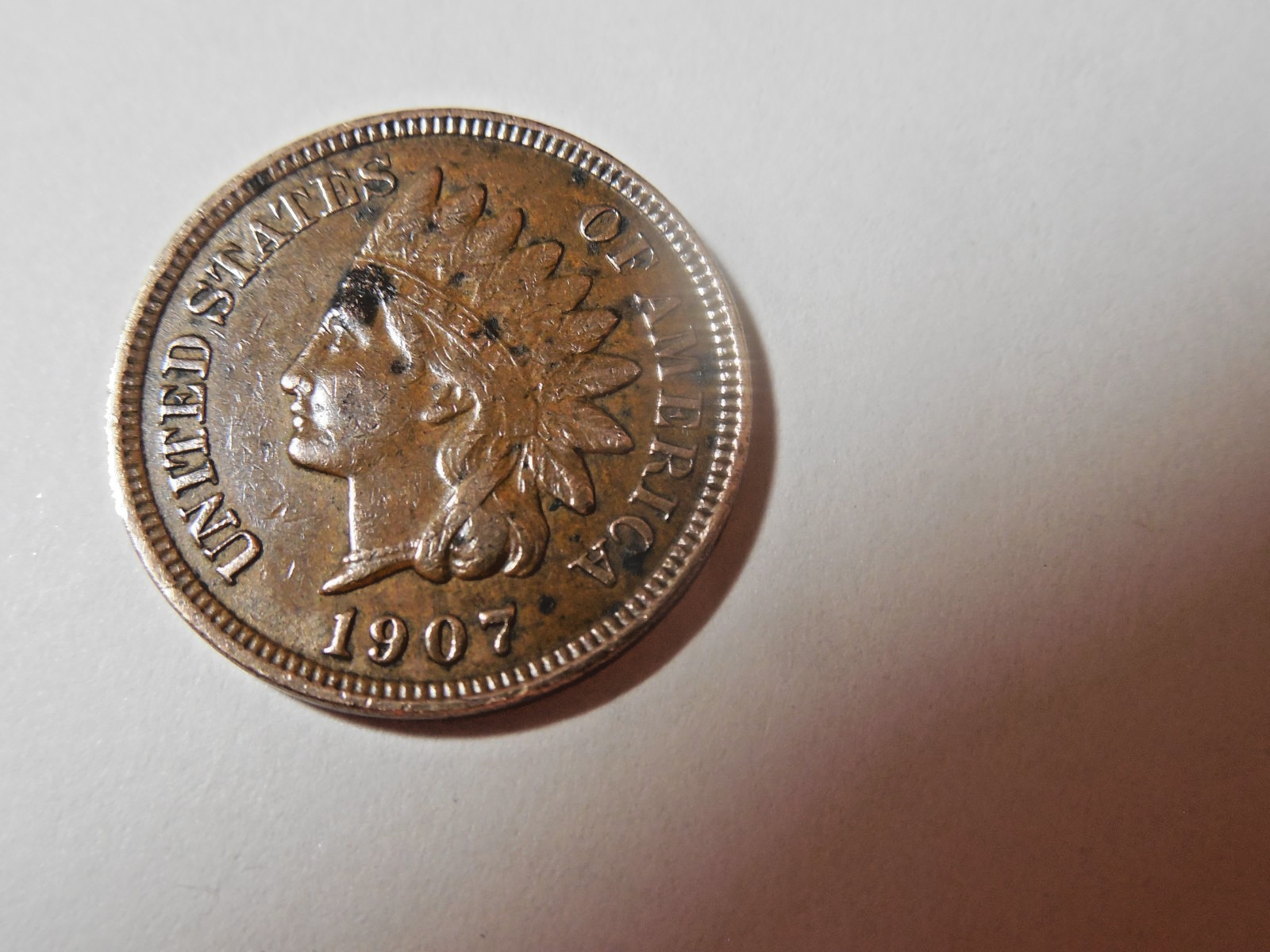 1907 Indian Head Penny in about XF condition.  Liberty, great rim, diamonds.
