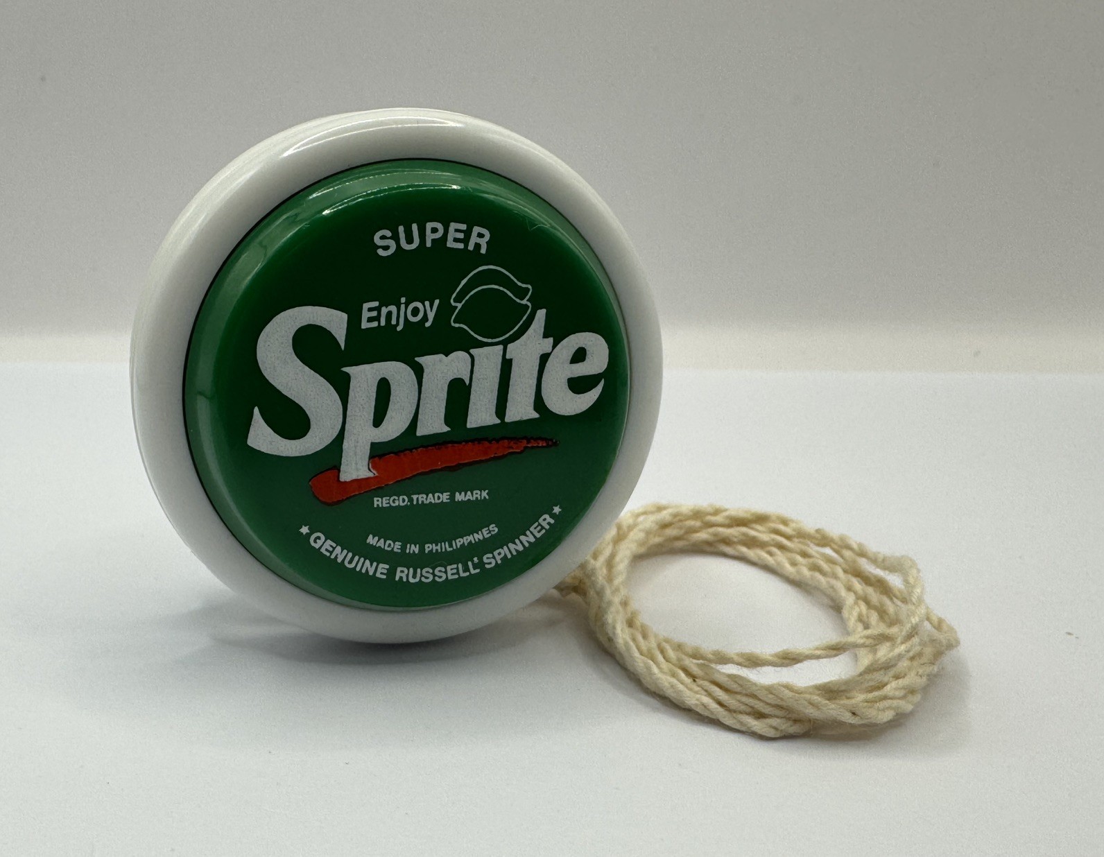 Genuine Russell spinner yo-yo - Sprite ‘ Super’ + stand. ￼ ￼