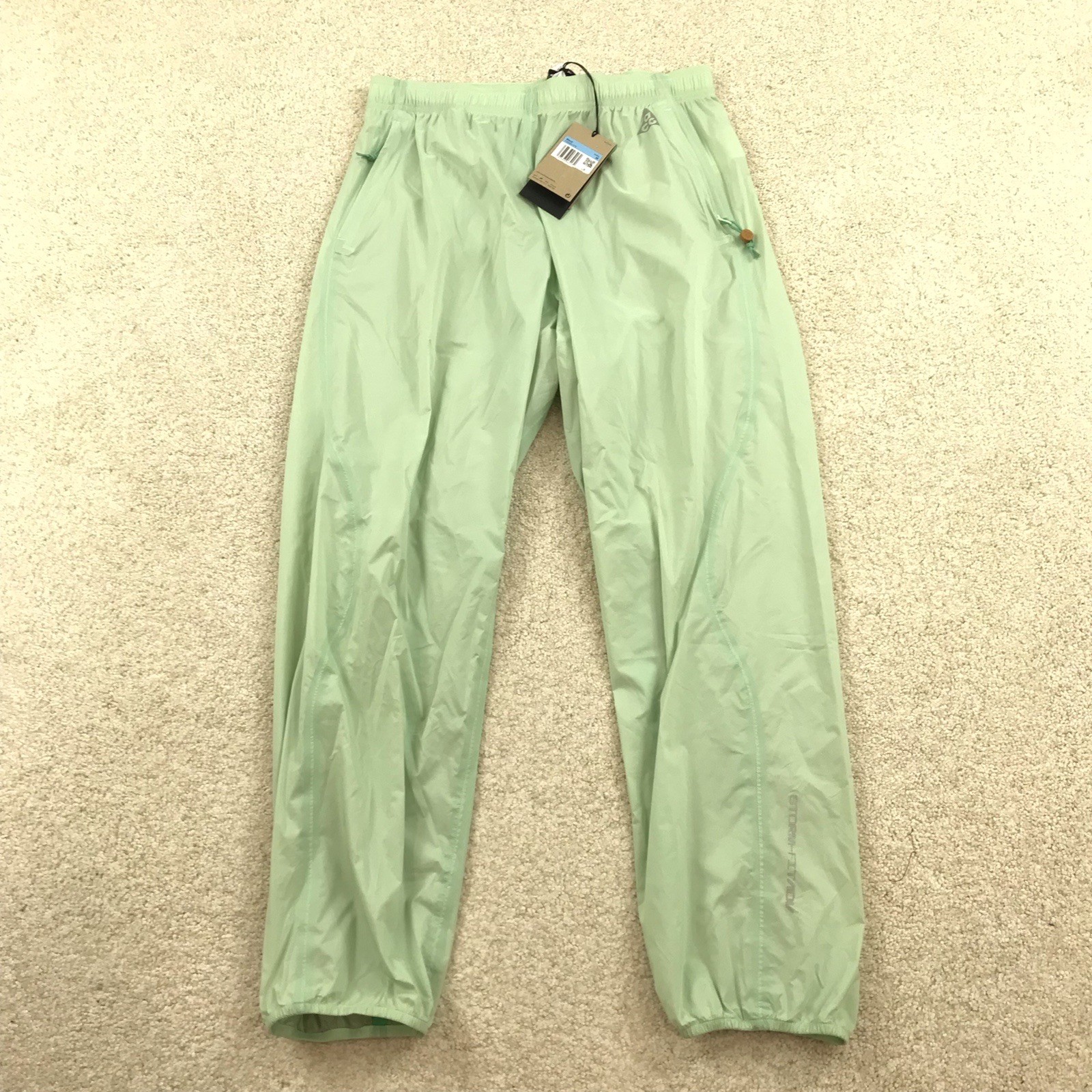 Nike ACG Trail Snacks Storm-Fit ADV Packable Hiking Pants Medium Green FQ3064