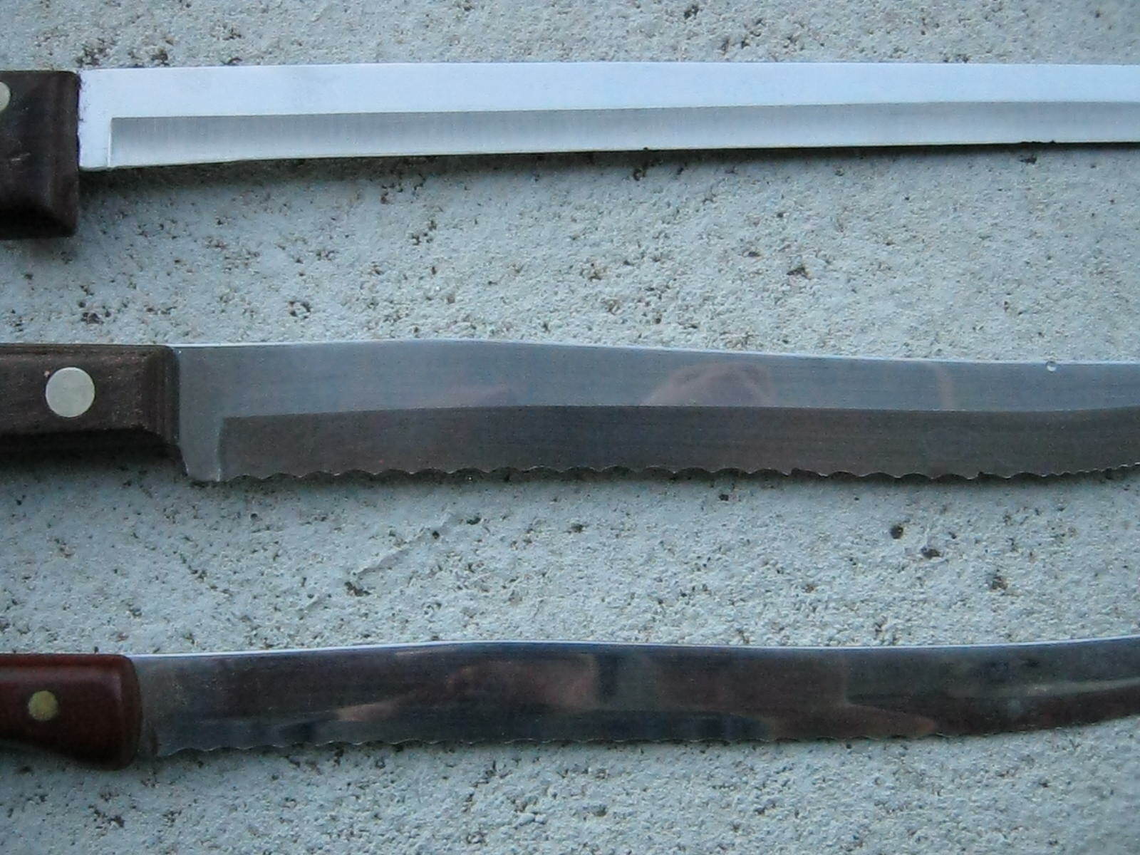 VINTAGE EKCO ETERNA, ONEIDA, & WEST BEND USA BREAD & CARVING KNIVES, LOT OF 3