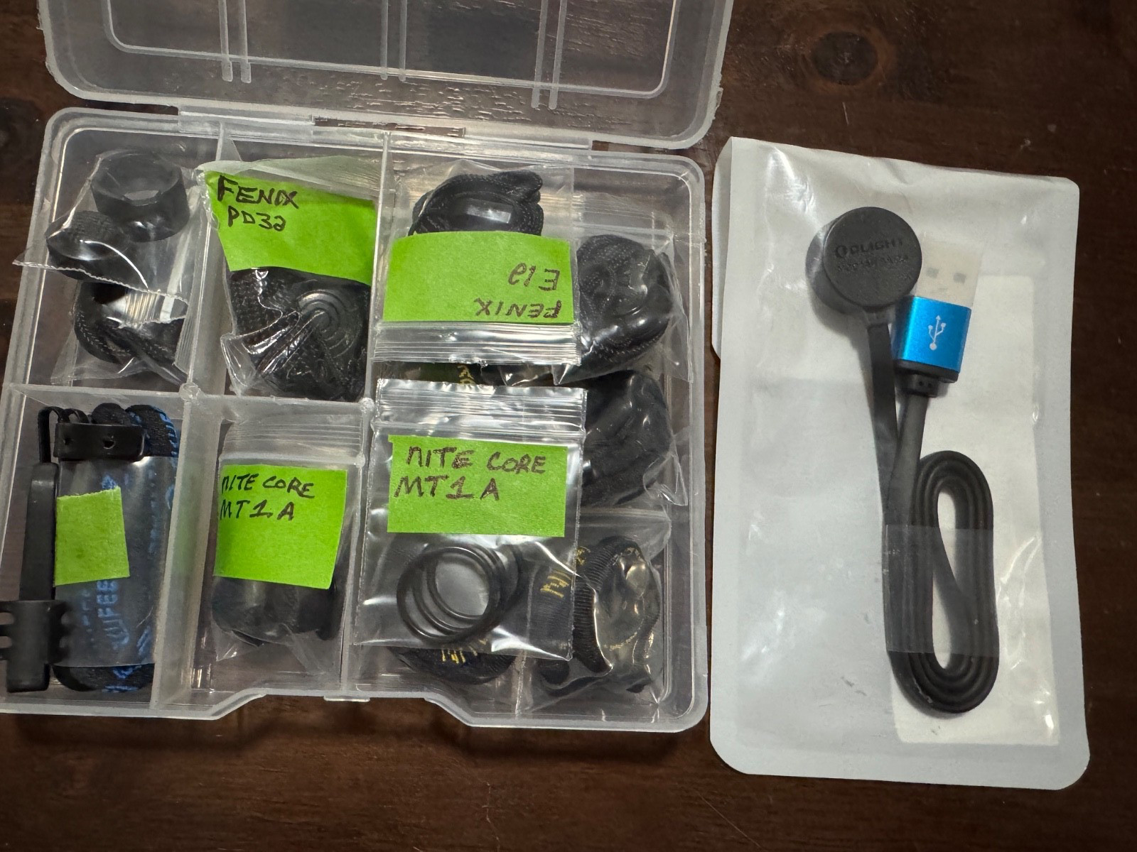 Flashlight Lanyards, O rings and an Olight Flashlight Charger