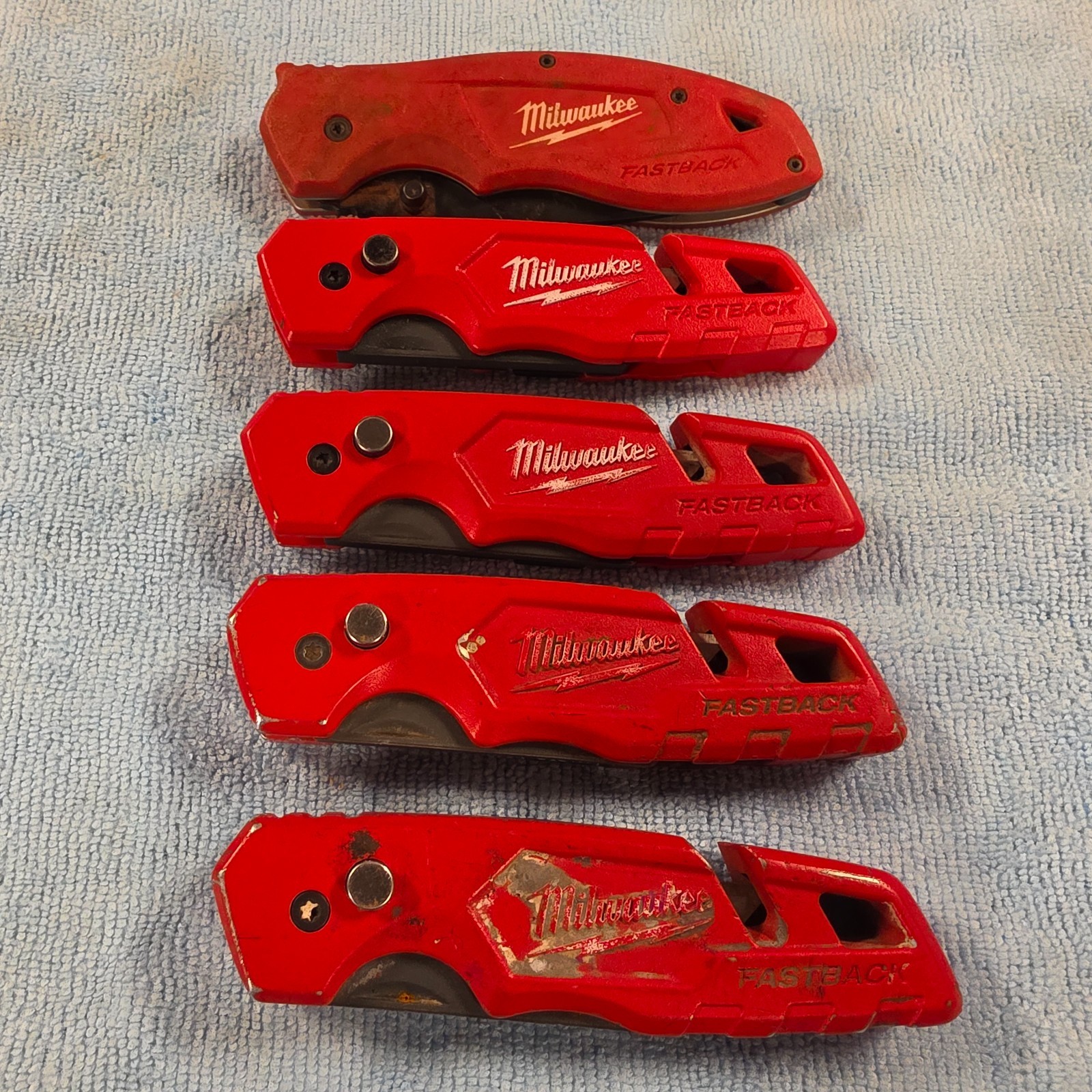 LOT OF 5 MILWAUKEE FASTBACK 48-22-1502, 1501 & 1995 UTILITY KNIVES USED SET #8