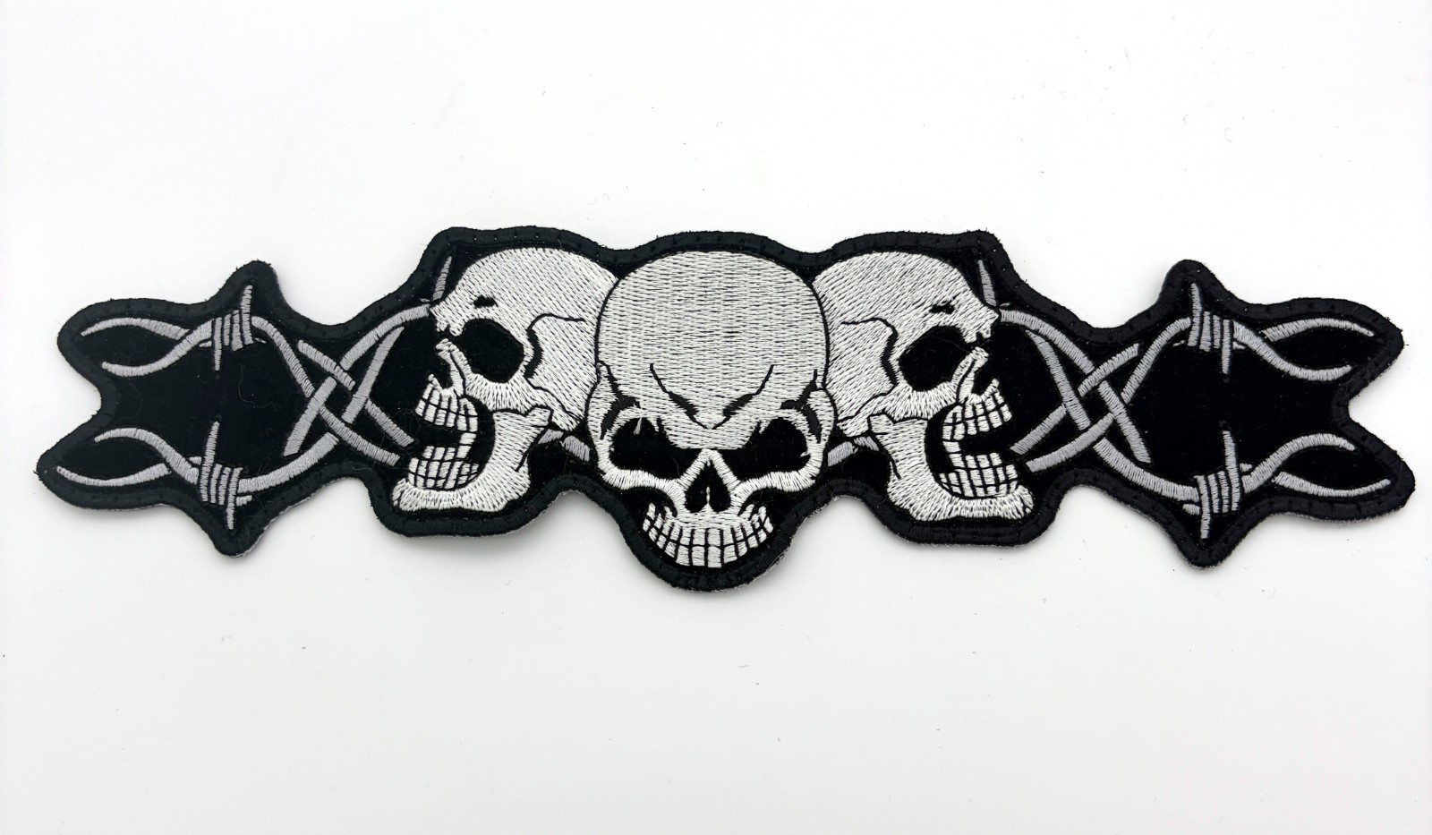 Hot Leathers PPA1056 Barbed Wire Skull Trio 10" x 3" Patch - SEW ON