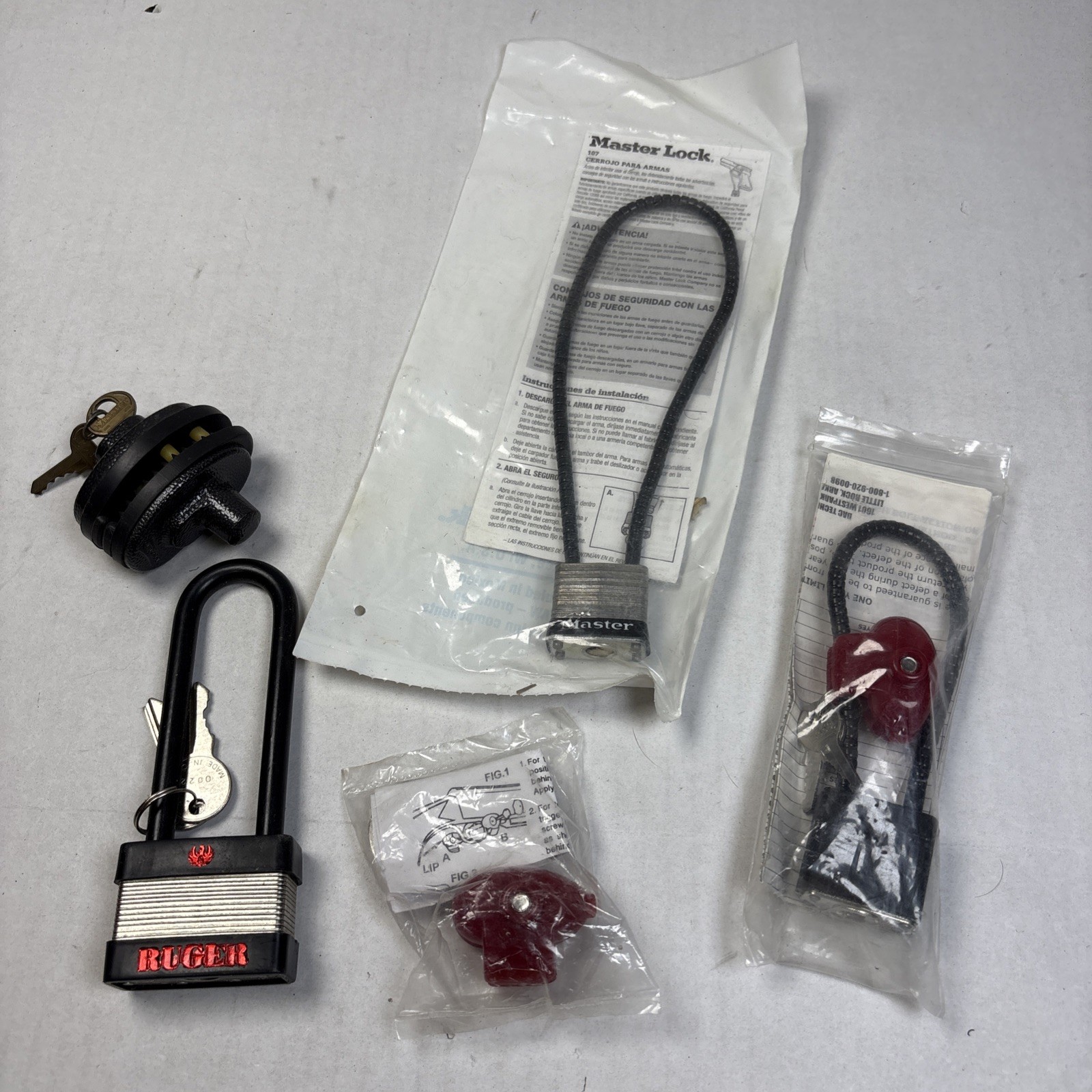 Gun Lock Lot Ruger Master Lock Cable & Trigger Locks w/ Keys –  5 Pieces