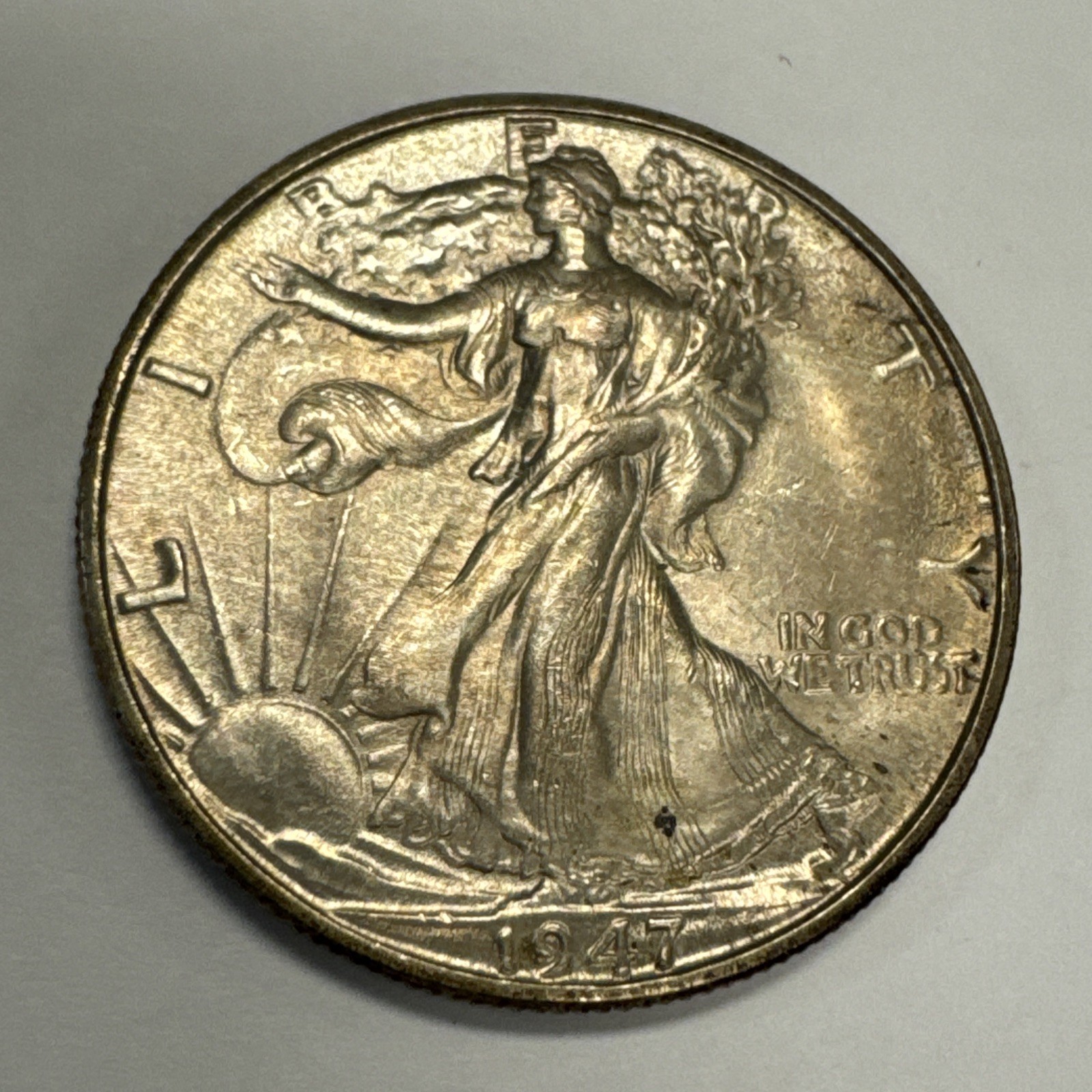 1947-D Walking Liberty Half Dollar Uncirculated-Toned