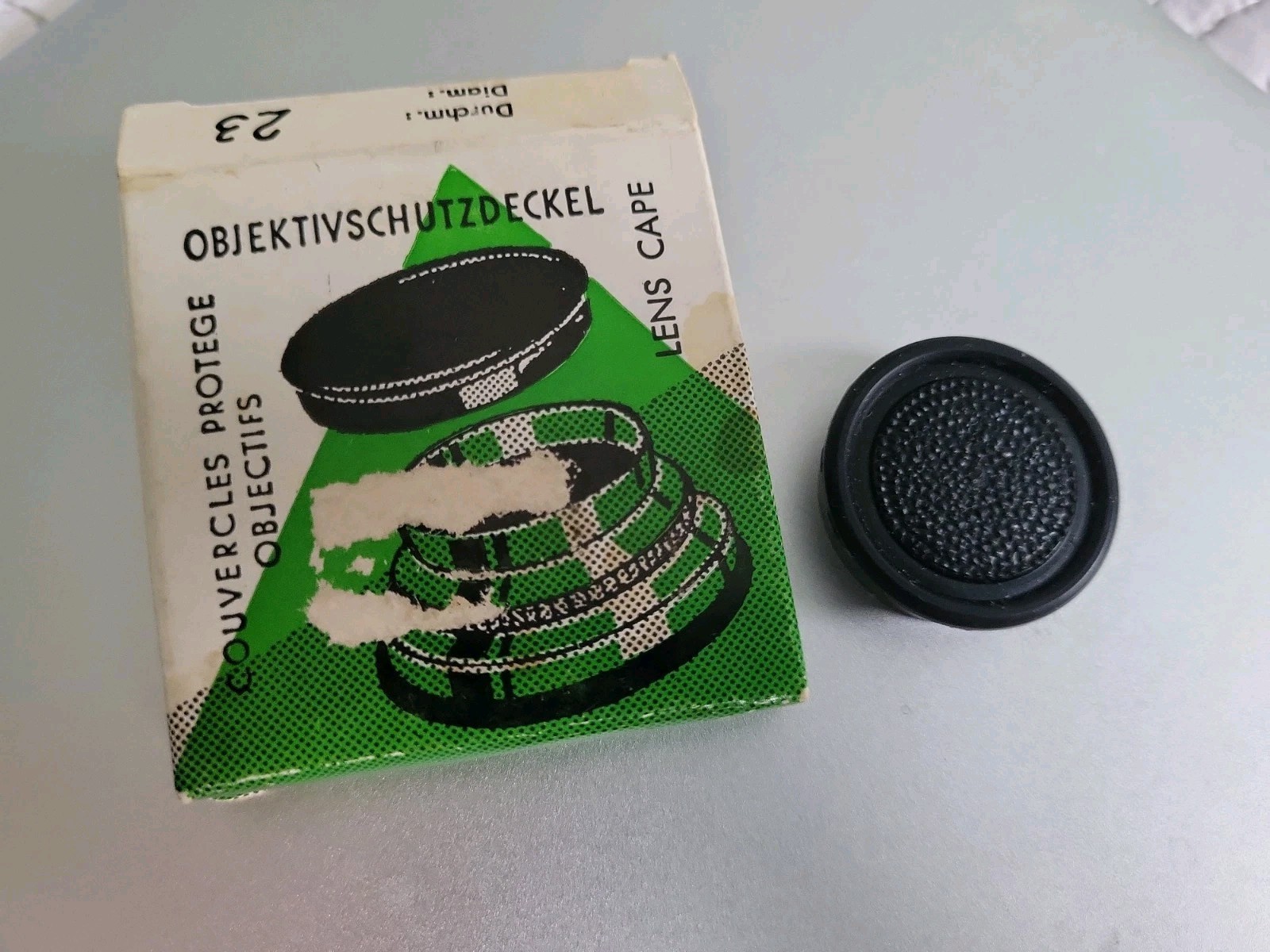 German Plastic 23mm Lens Cap  In Box. New Old Stock