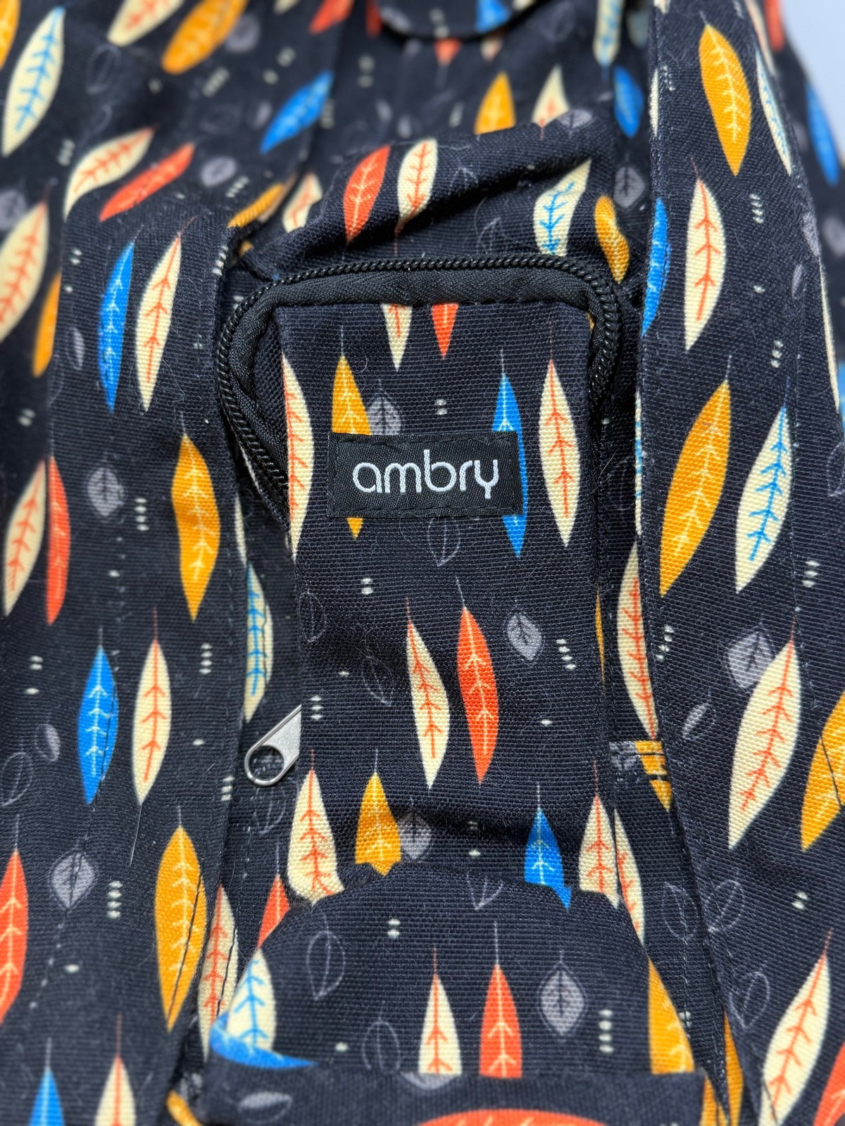 Multicolored Feather Patterned Adjustable Rope SLING BACKPACK by Ambry