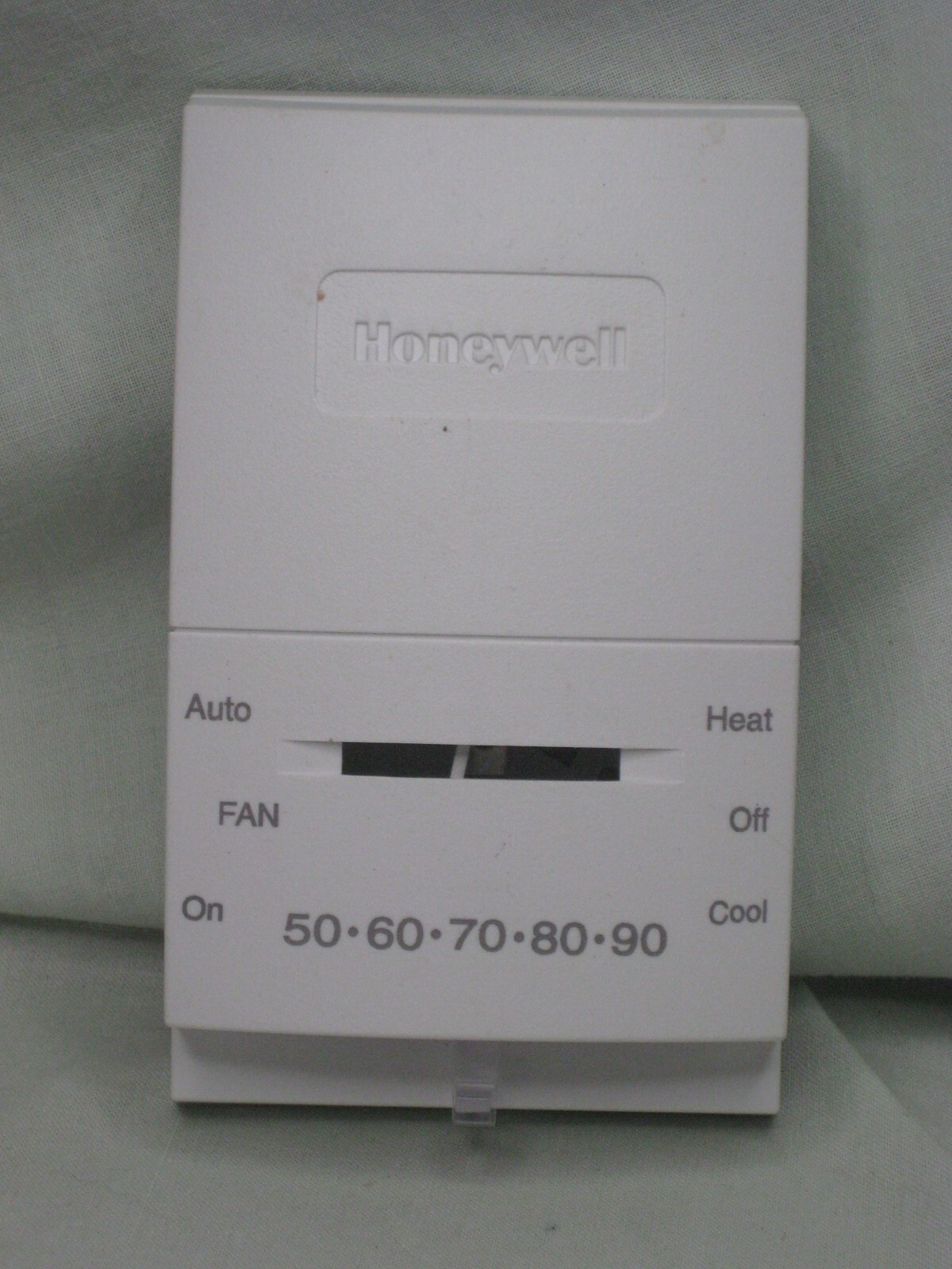 Honeywell CT51N1007 thermostat heating cooling non programmable heat fan control